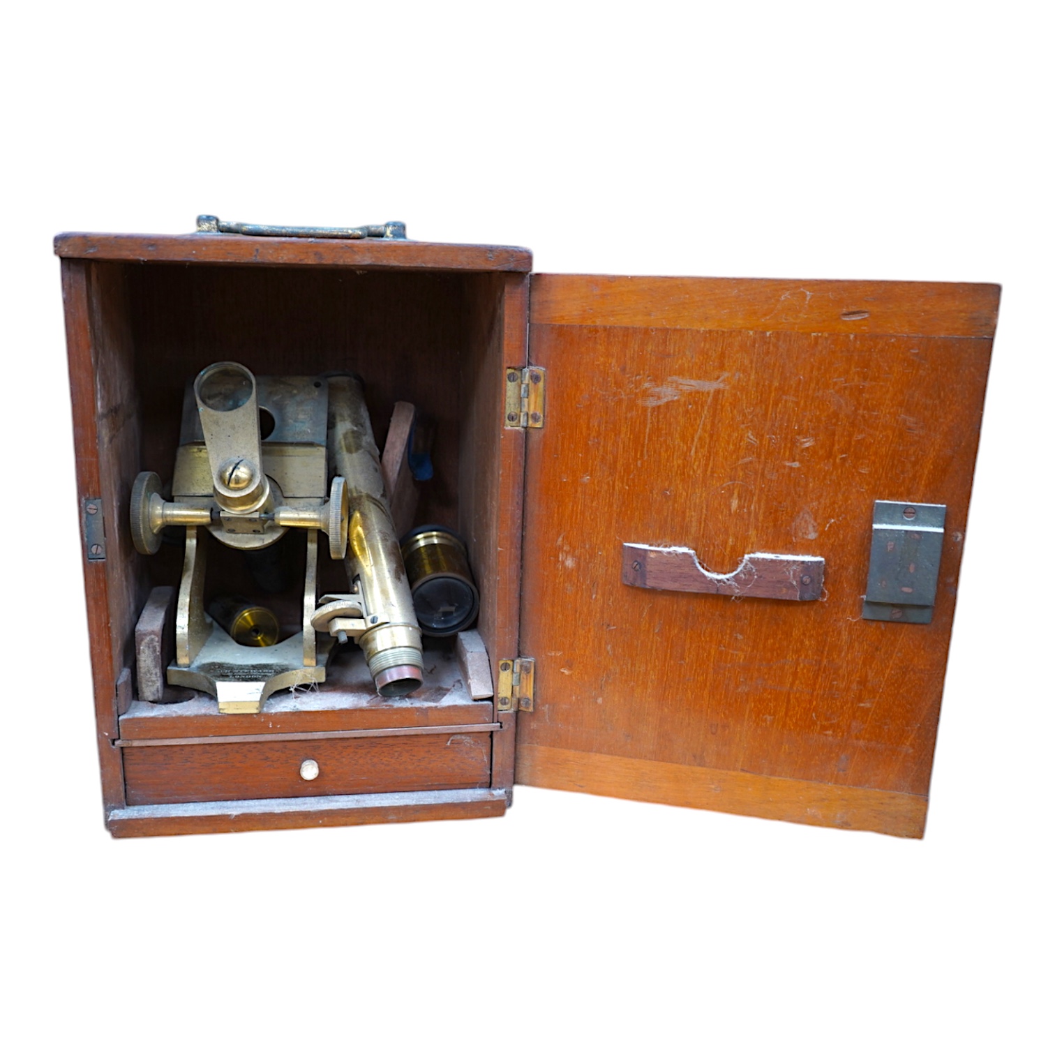 A mahogany cased late 19th century brass microscope by J.H. Steward, 456 West Strand London, with a drawer underneath containing a few prepared microscope slides, case 27cm high, 19.5cm wide, 15.5cm deep. Condition - poo