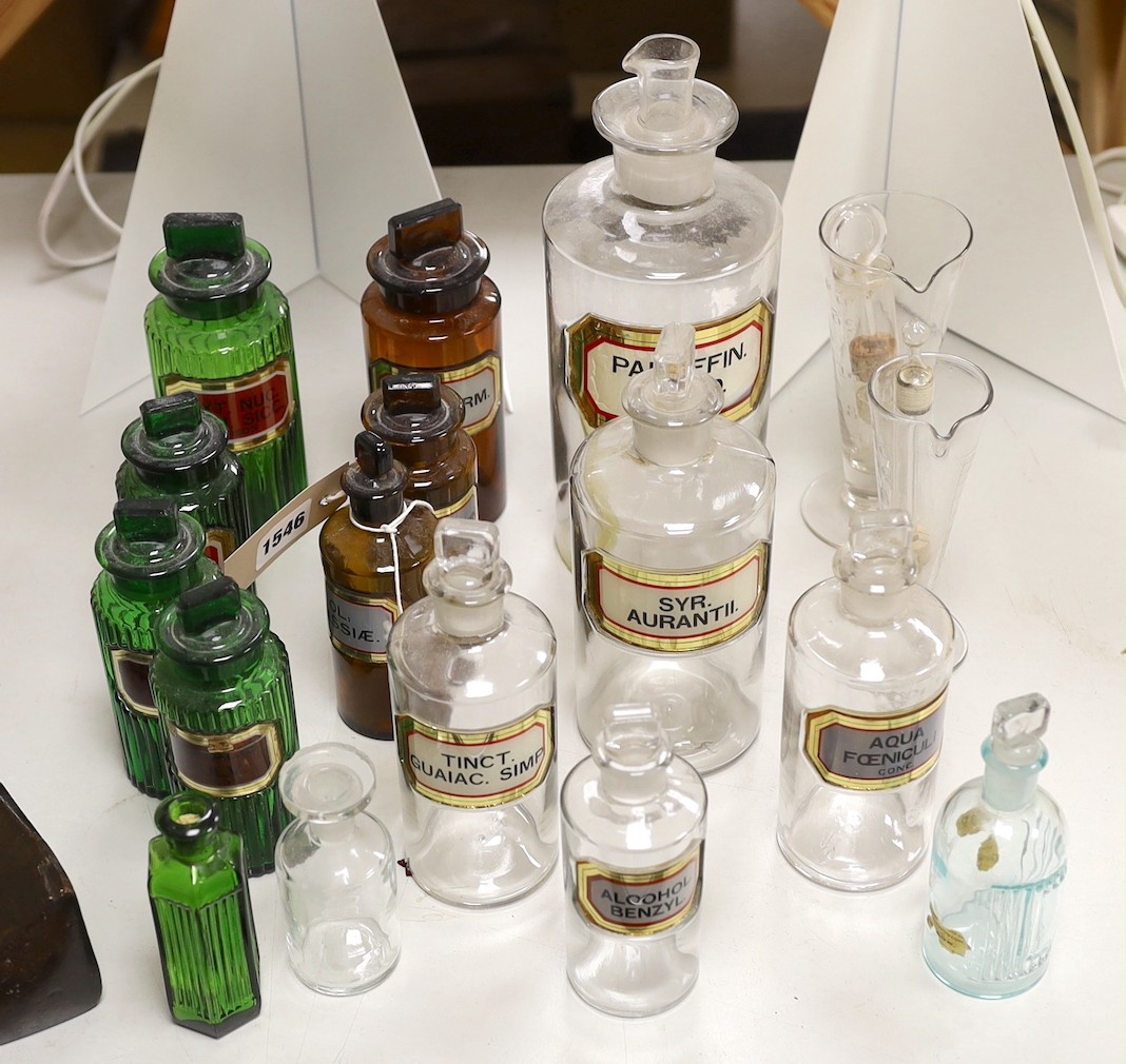 A collection of apothecary bottles, two measures and files, tallest bottle 27cms high                                                                                                                                       