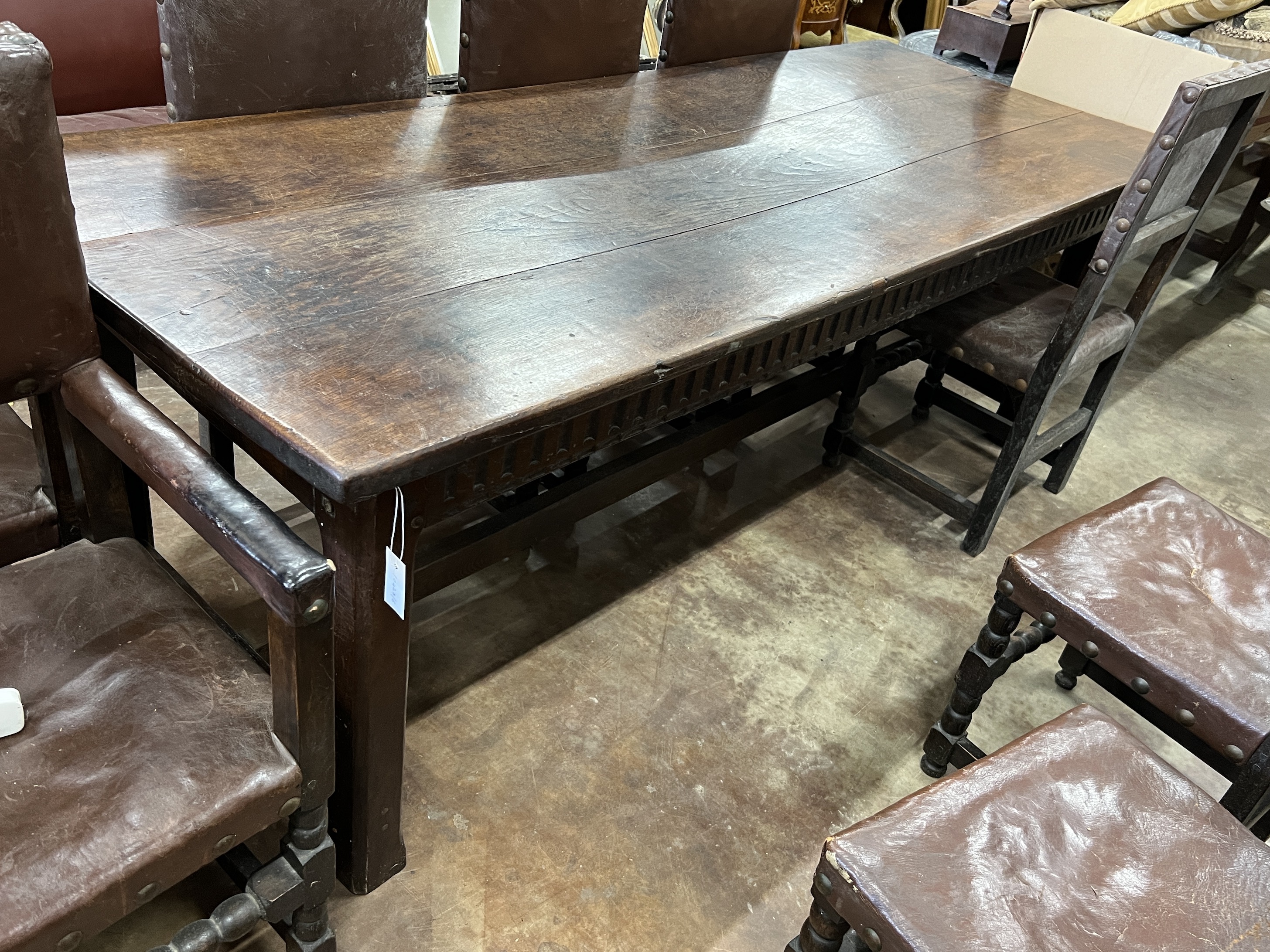 A 17th century style oak refectory dining table, length 220cm, width 85cm, height 75cm                                                                                                                                      