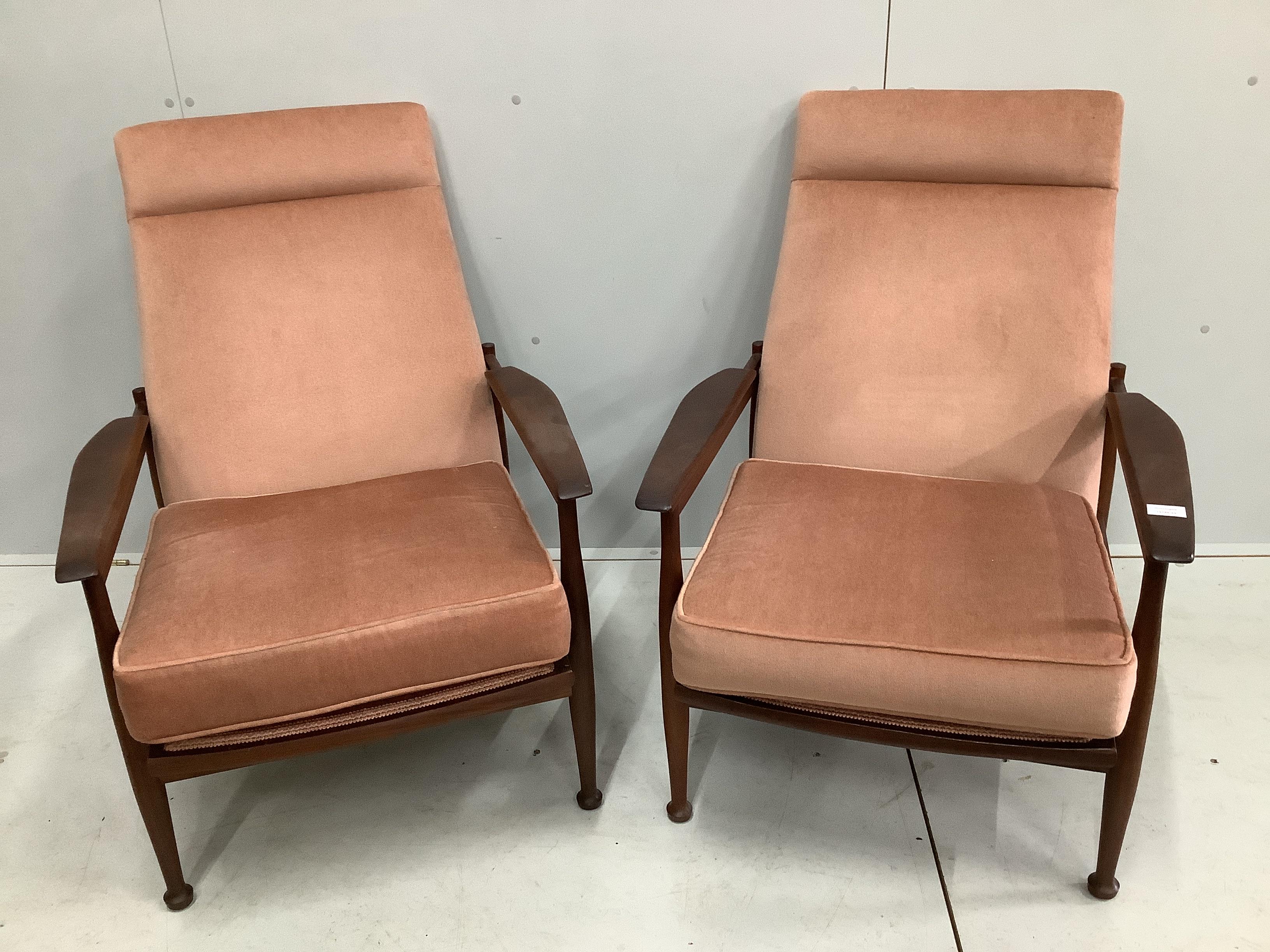 A pair of mid century Danish design teak reclining armchairs, width 68cm, depth 85cm, height 90cm                                                                                                                           