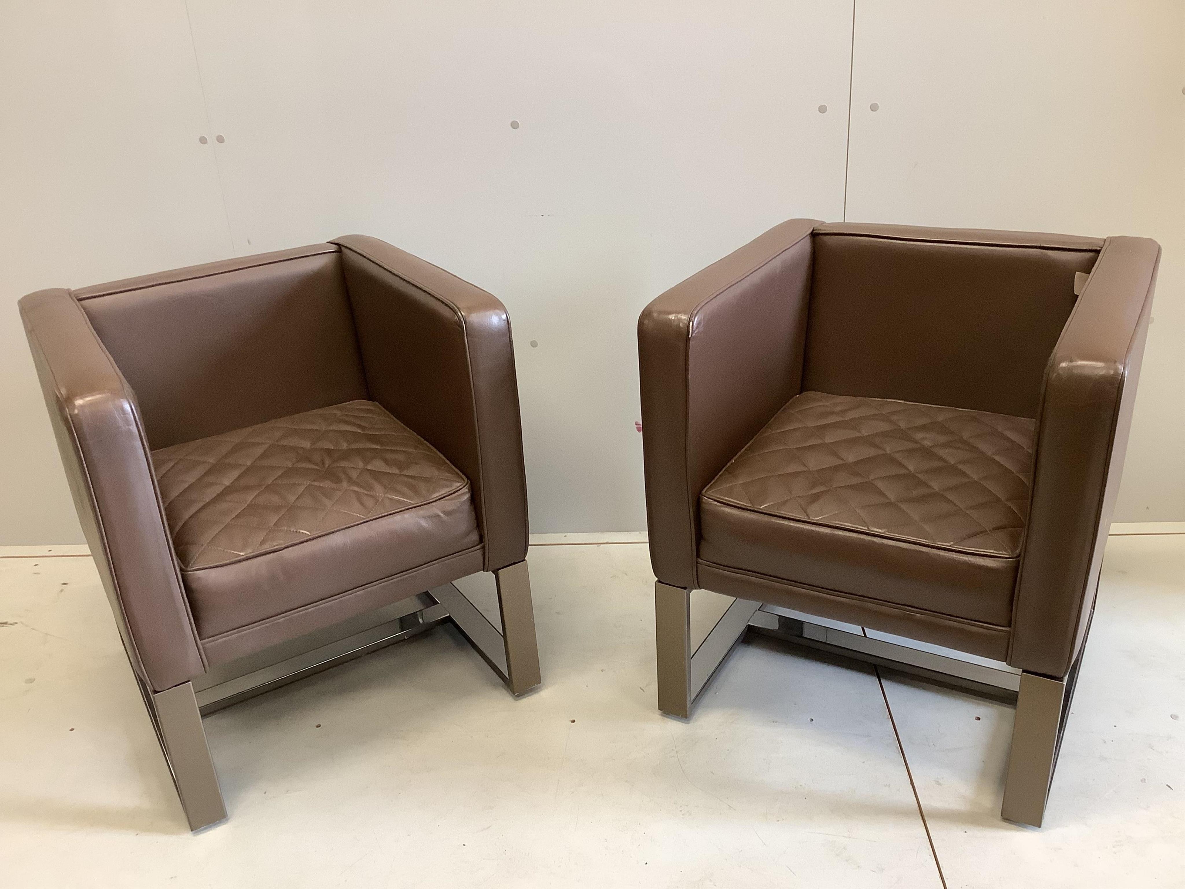 A pair of Contemporary brown leather square frame armchairs, width 61cm, depth 60cm, height 70cm. Condition - fair                                                                                                          