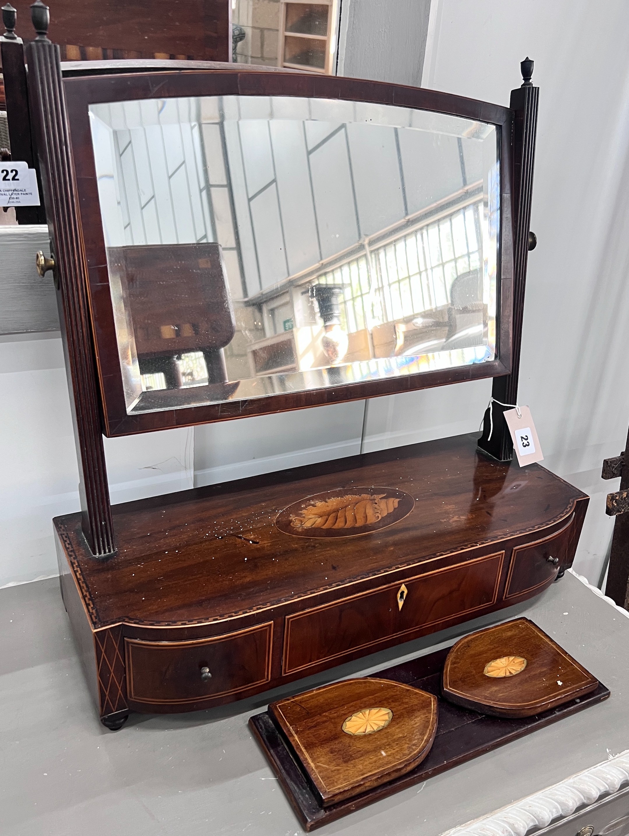 A George III inlaid mahogany toilet mirror, width 55cm, height 57cm together with an Edwardian inlaid book slide *Please note the sale commences at 9am.                                                                    