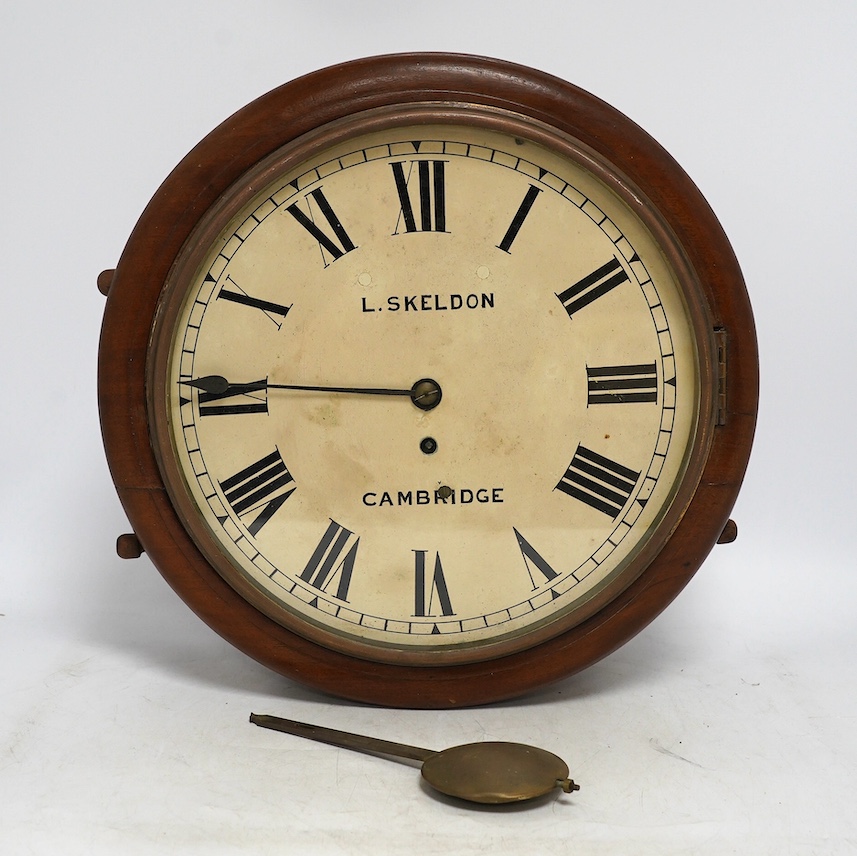 A late 19th century mahogany fusee wall clock, signed L Skelton, Cambridge to the painted 12” dial. Condition - poor, hour hand broken and missing, pendulum suspension spring broken                                       