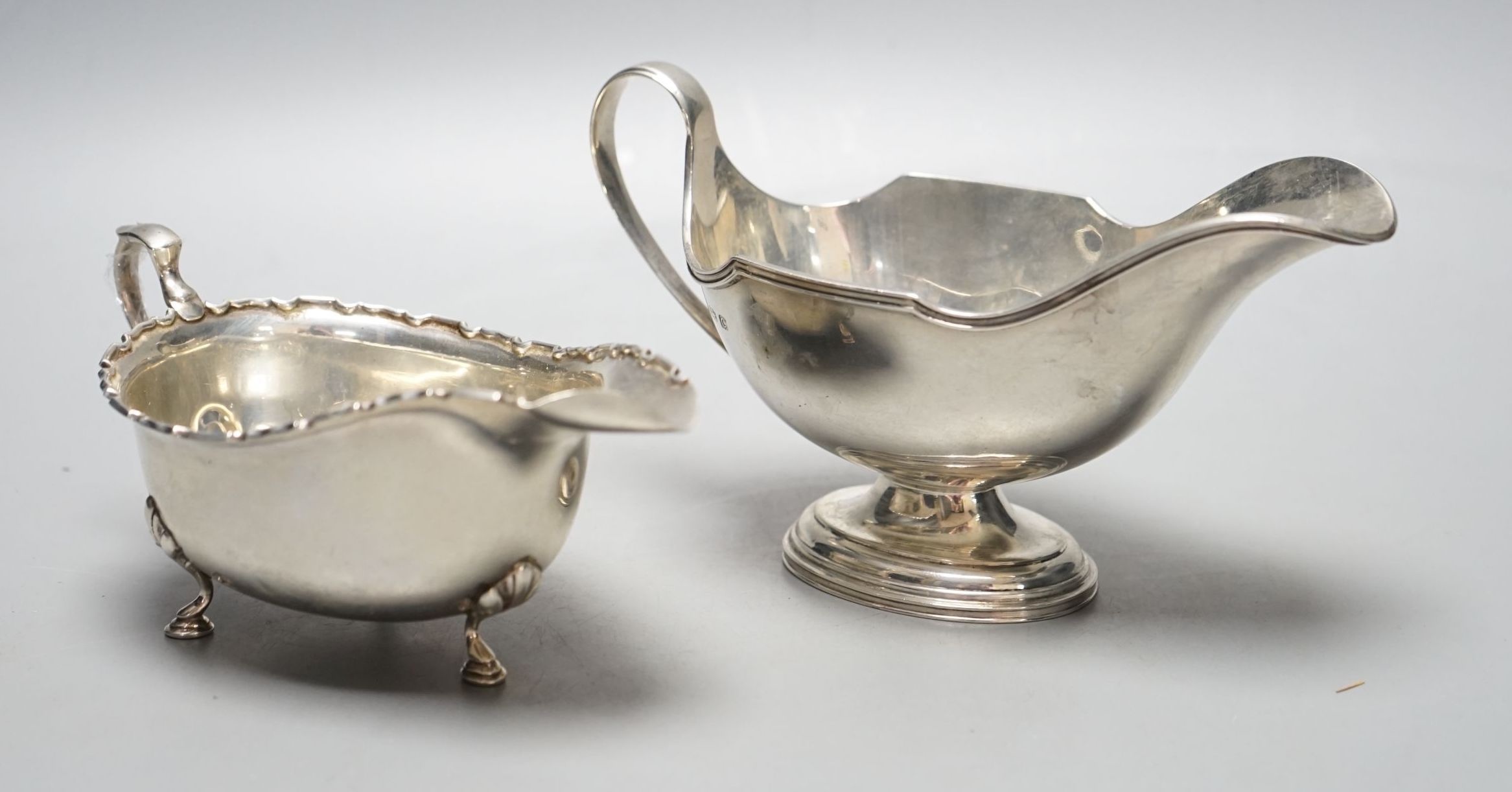 Two George V silver sauceboats, Birmingham, 1926/7, 245 grams.                                                                                                                                                              