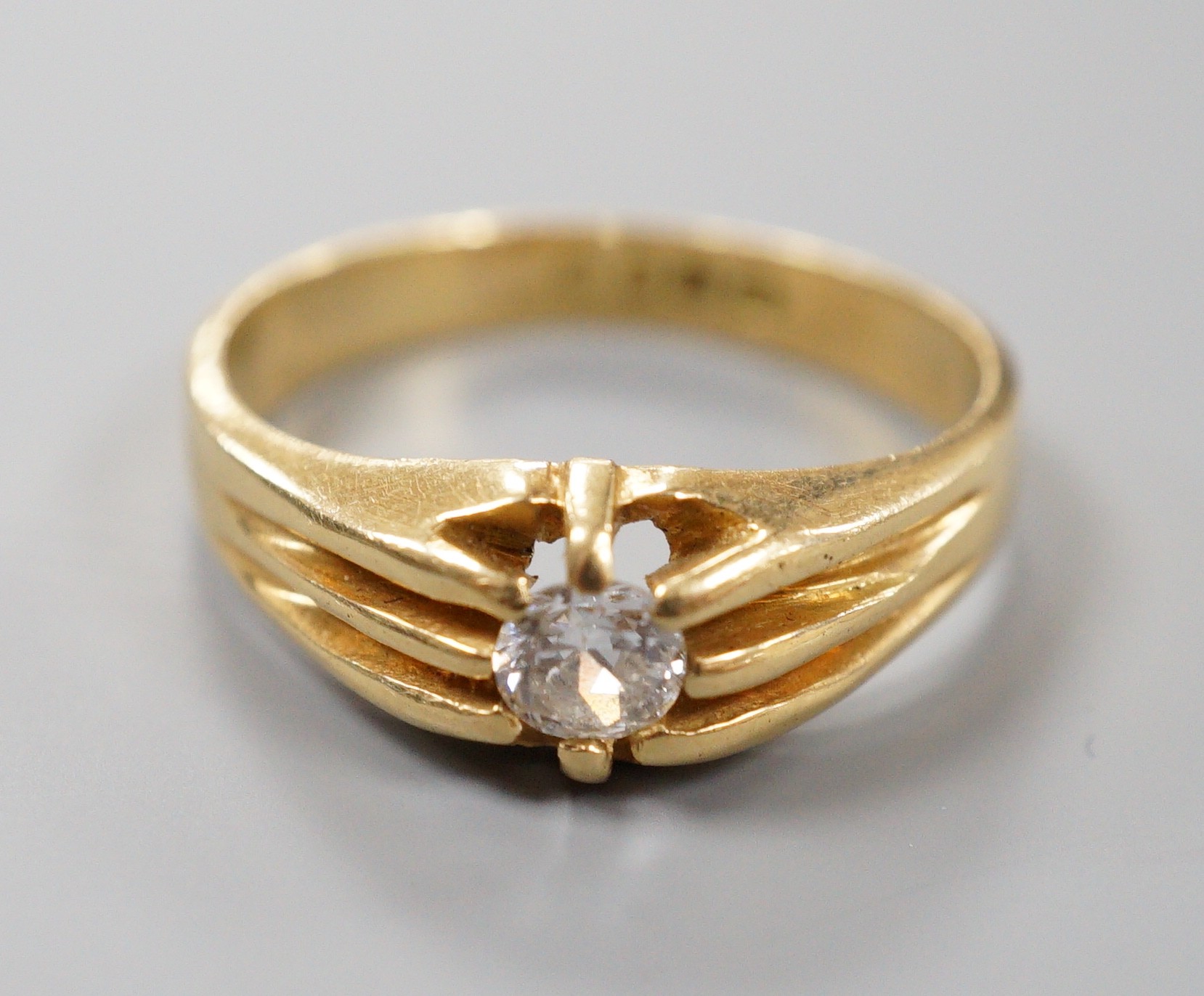 A late Victorian 18ct gold and claw set solitaire diamond ring, size, S/T, gross 6.3 grams.                                                                                                                                 