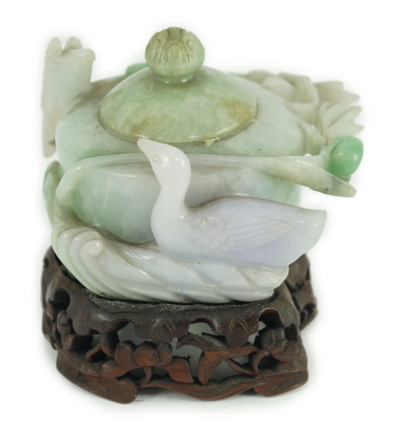 A Chinese lavender and green jadeite water pot and stand, late 19th century, 9.3cm at widest point, wood stand                                                                                                              