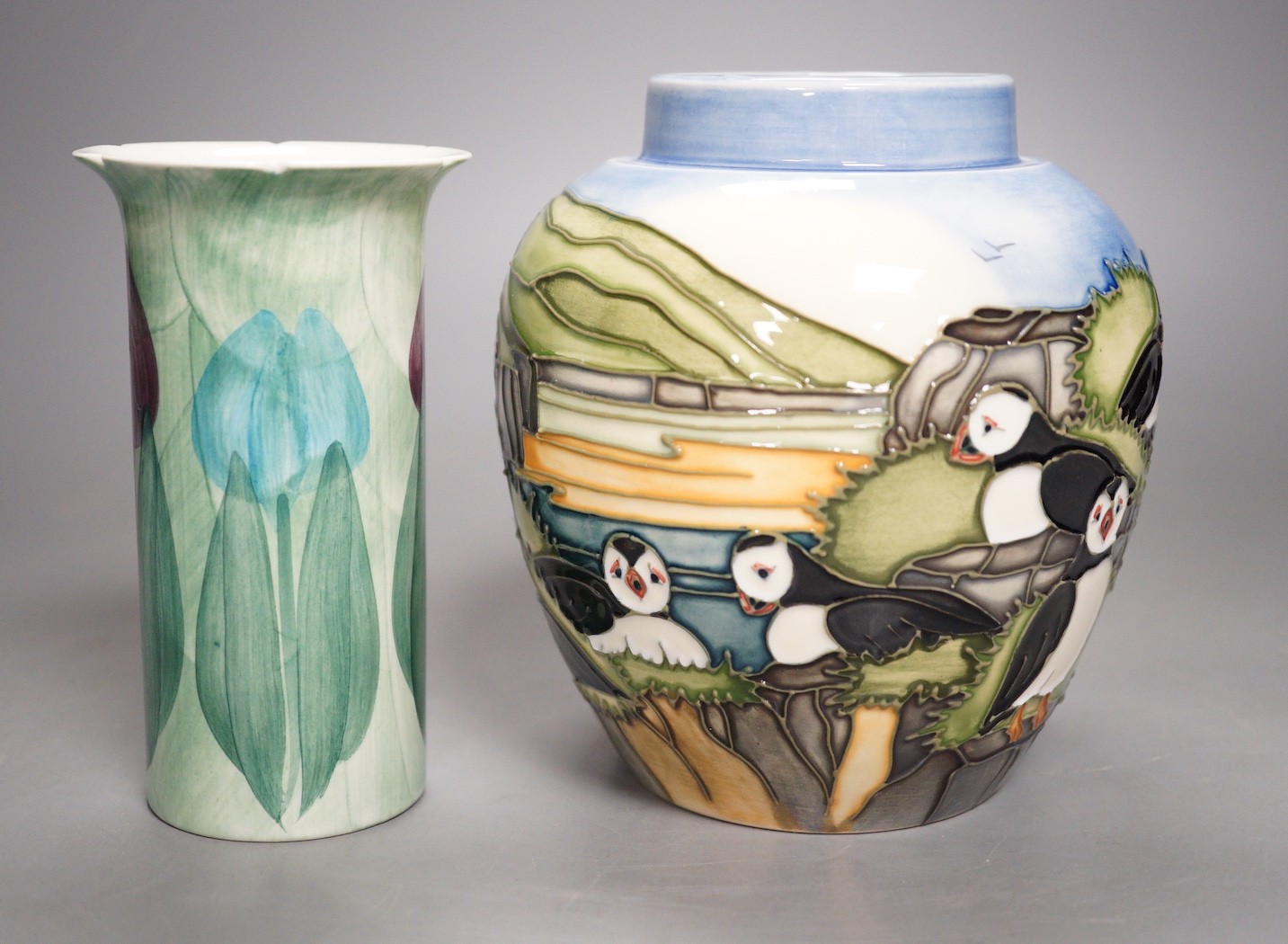 A Moorcroft pottery jar, decorated with puffins and a Jersey pottery "mini tulips’ vase, tallest 13.5cm                                                                                                                     