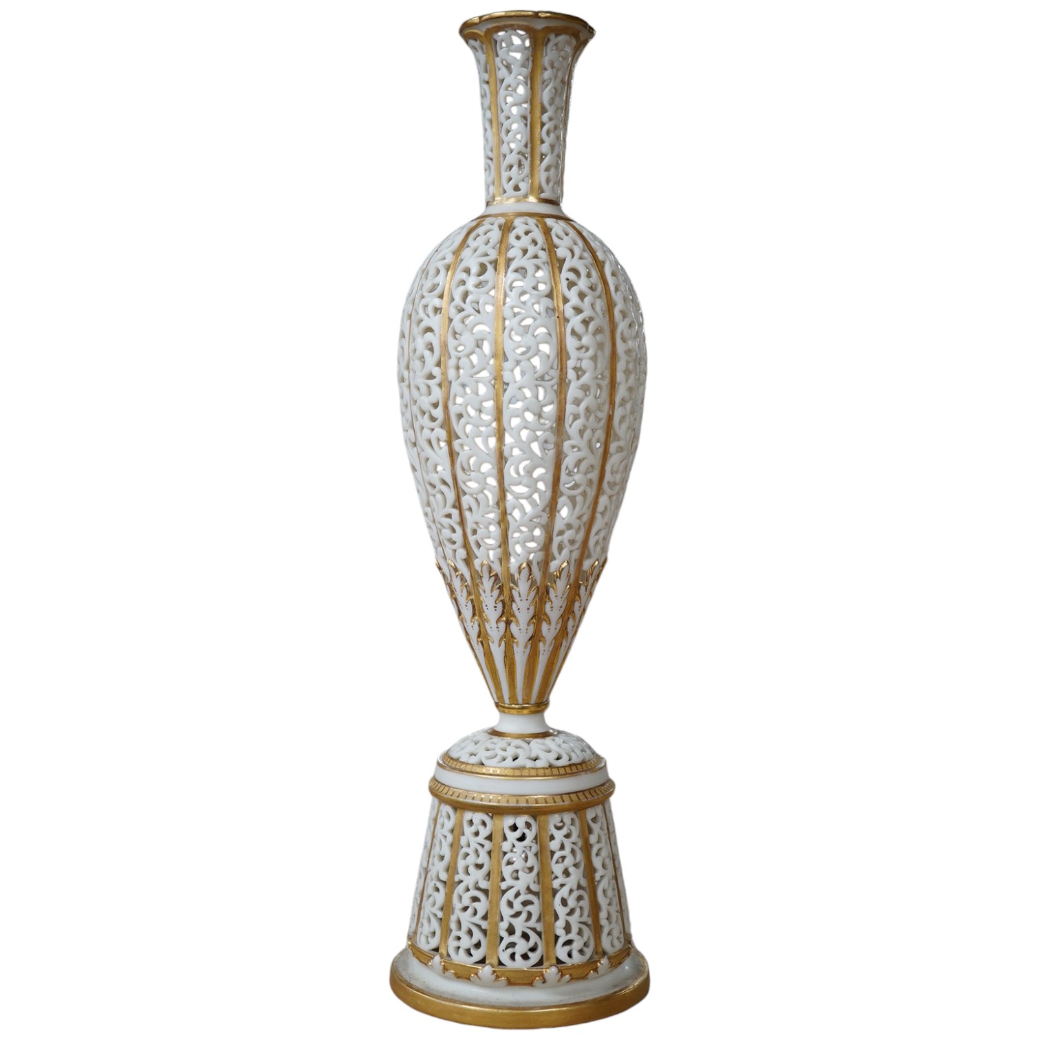 A Grainger's reticulated posy vase with gilded decoration, 29cm high. Condition - good                                                                                                                                      