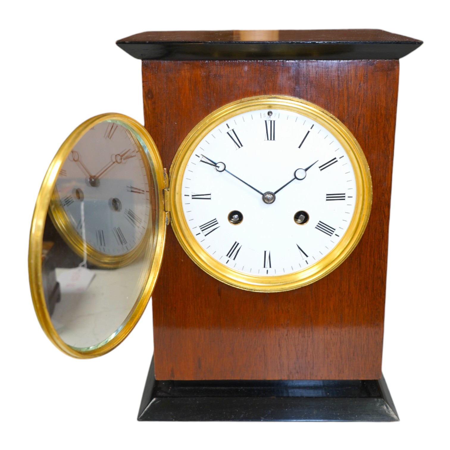 A George V mahogany and ebonised eight day movement mantel clock, 27cm high. Condition - good - No bell.                                                                                                                    