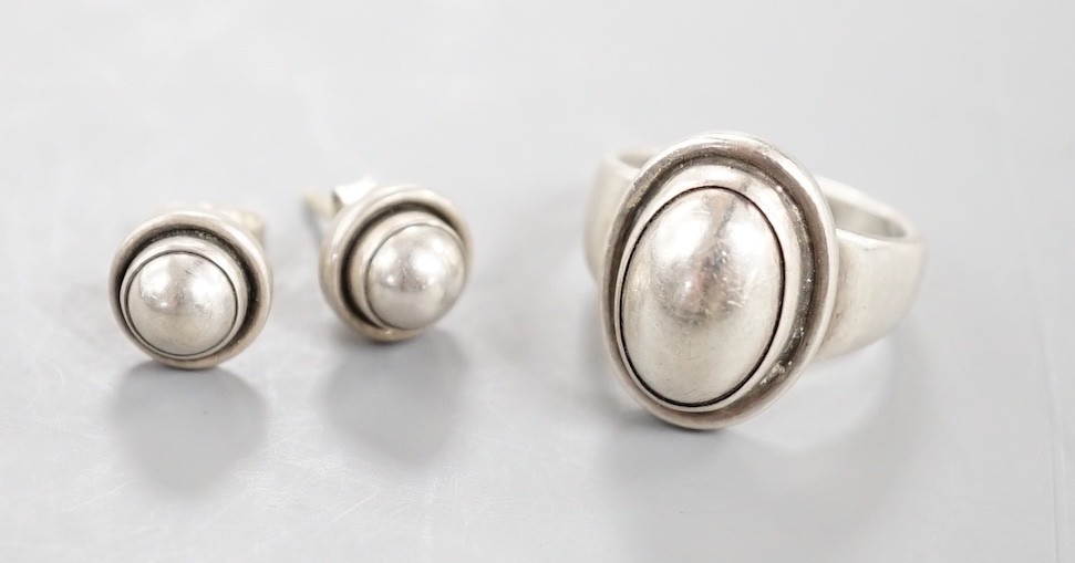 A Georg Jensen sterling 925 ring, no. 46B, size K/L and a pair of similar earrings, no.8.                                                                                                                                   