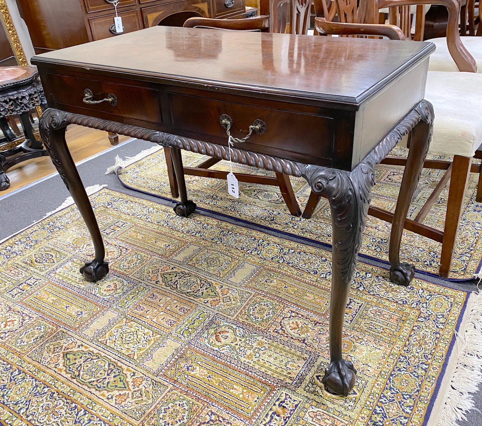 An early 20th century Chippendale revival mahogany two drawer side table, width 91cm, depth 51cm, height 71cm                                                                                                               