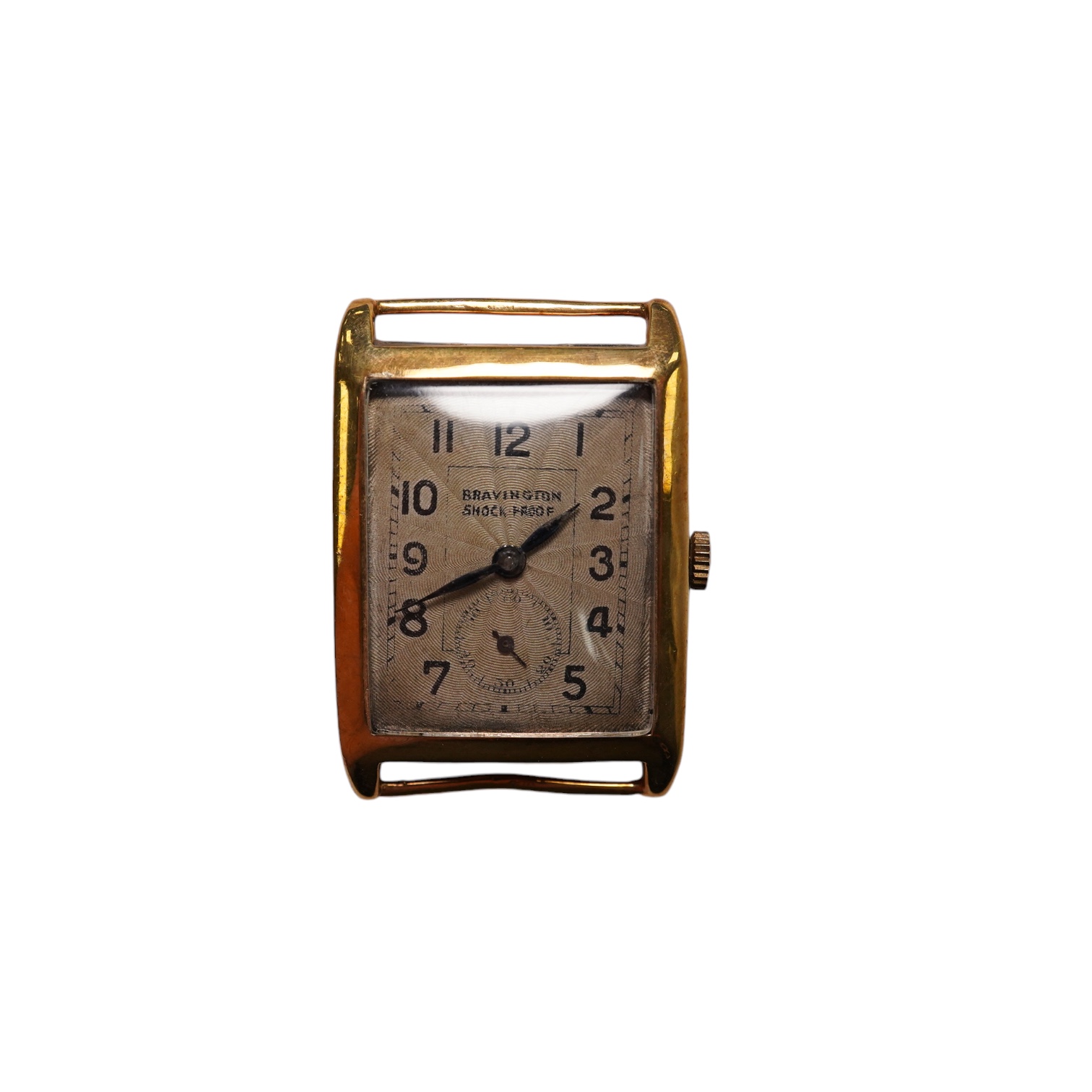 A gentleman's 9ct gold rectangular dial, manual wind wrist watch, retailed by Bravington, case diameter 26mm, no strap. Condition - poor to fair                                                                            