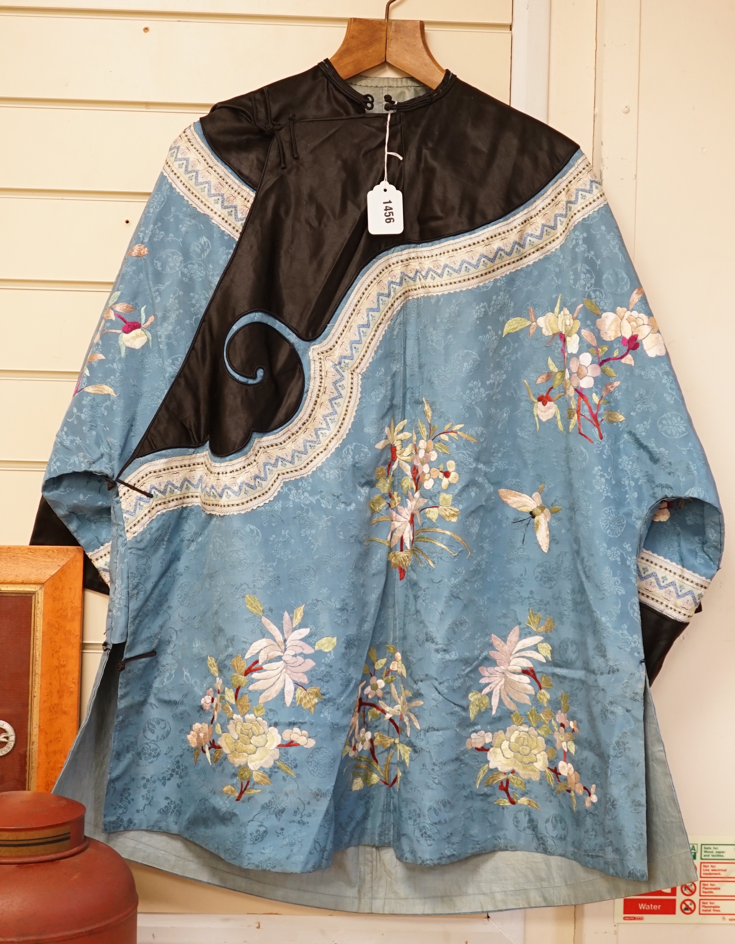 A Chinese silk embroidered robe, late 19th century                                                                                                                                                                          