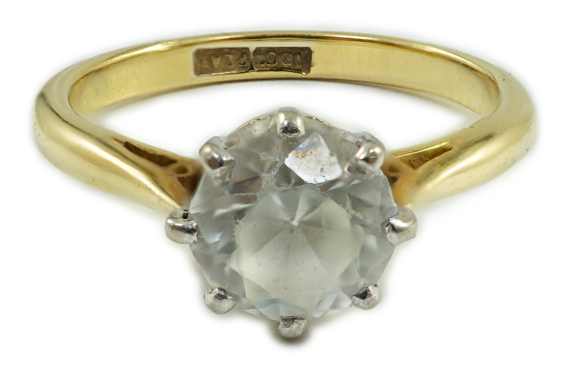 An 18ct, plat and single stone white zircon? set ring, size R, gross weight 4.8 grams.                                                                                                                                      