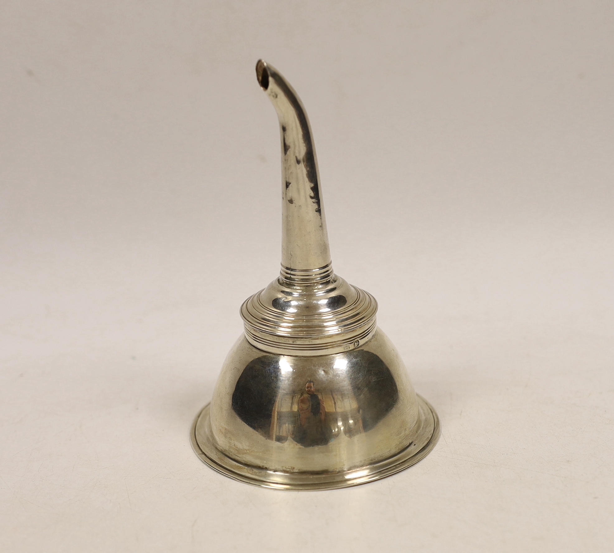 A George III silver wine funnel, by Peter, Ann & William Bateman, London, 1803, lacking muslin ring, 13.7cm.                                                                                                                