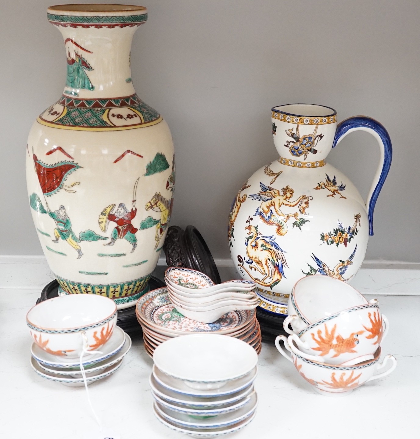 A Gien pottery jug, a Chinese crackle glaze baluster vase, egg-shell tableware and three Oriental wood stands                                                                                                               