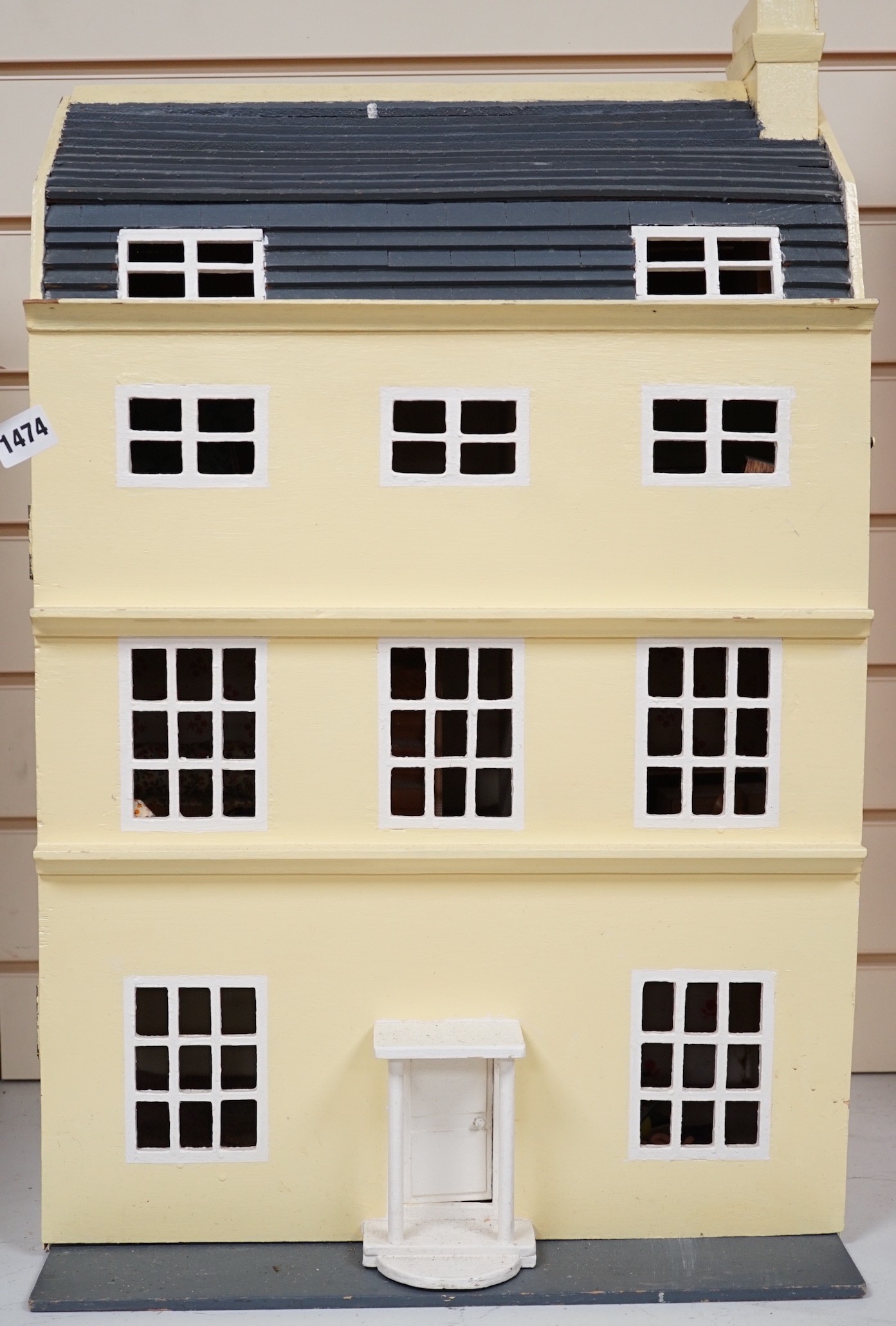 Doll's house based on a Georgian Bath townhouse, with contents, 43cms wide x 71cms high                                                                                                                                     