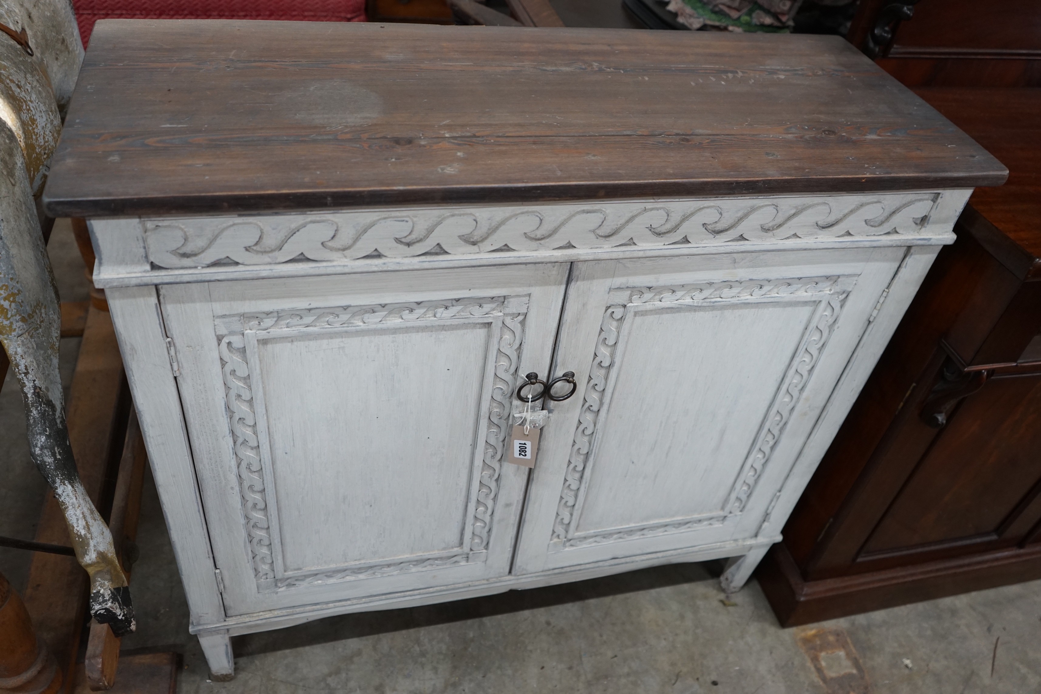 A Regency style painted pine two door side cabinet, width 101cm, depth 39cm, height 94cm                                                                                                                                    