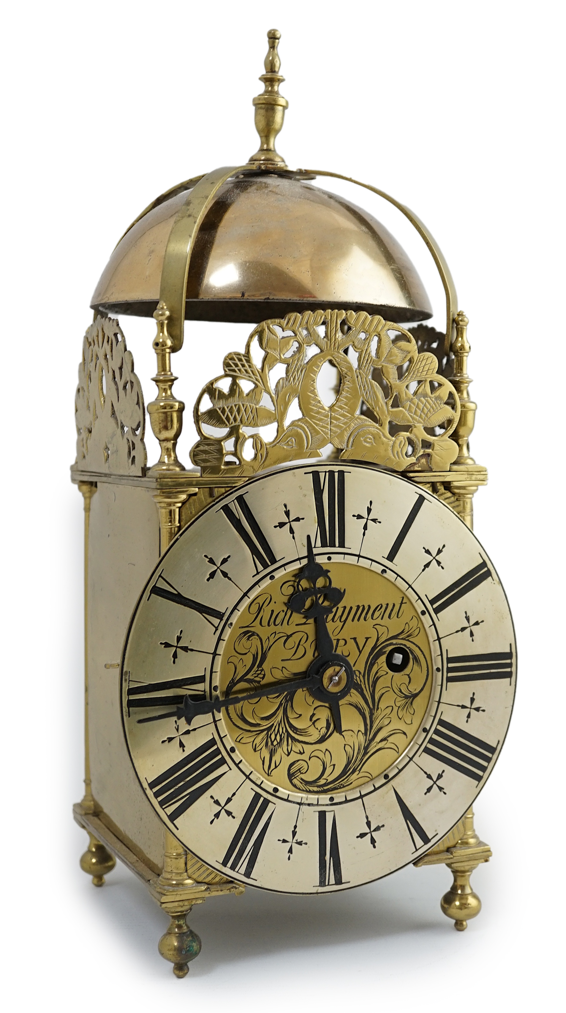 Manner of Richard Rayment of Bury. A Victorian 17th century style lantern clock, in traditional brass case with silvered Roman dial and eight day single fusee movement striking on a bell, 17cm wide, 14.5cm deep, 38cm hig
