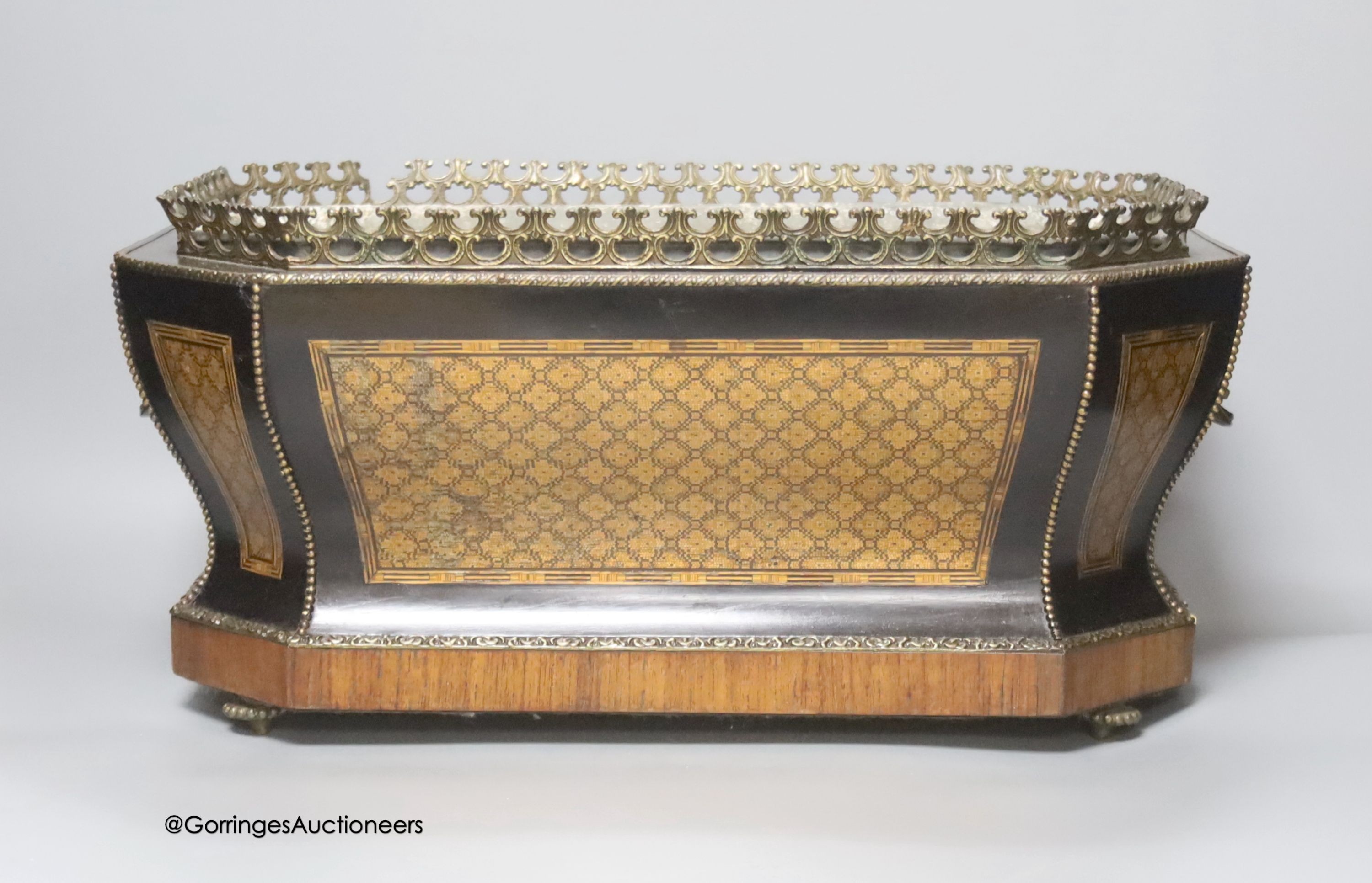 A 19th century French walnut and parquetry jardiniere, length 42cm                                                                                                                                                          