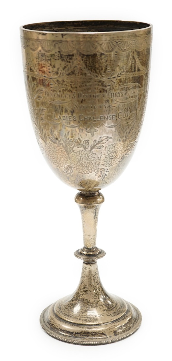 A late Victorian engraved silver presentation goblet, possible Charles Boyton, London, 1890, 23cm, 7.8oz.                                                                                                                   
