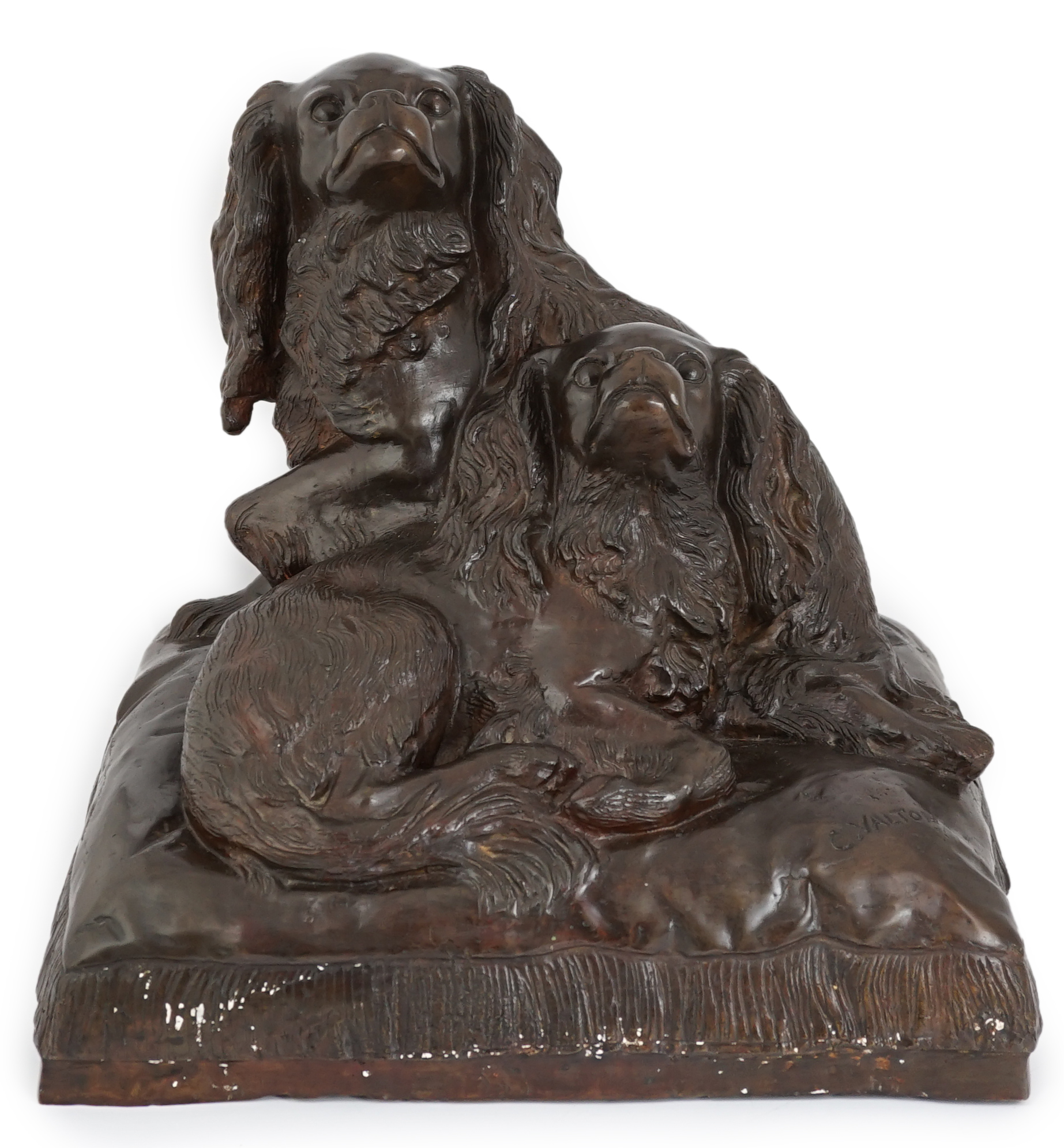 After Charles Valton (French, 1851-1819), a bronze group of two King Charles spaniels seated upon a cushion, 46cm wide, 42cm high                                                                                           