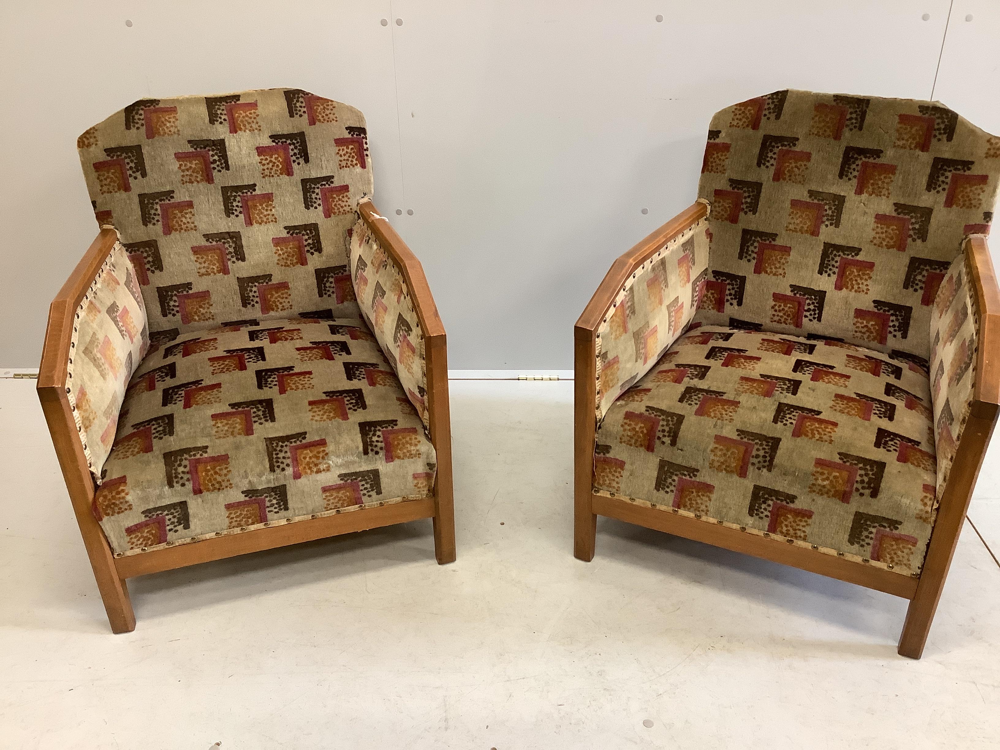 A pair of French Art Deco upholstered beech armchairs, width 62cm, depth 68cm, height 76cm                                                                                                                                  