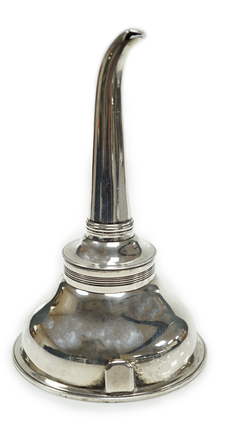 A George III silver wine funnel, Hannah Northcoat?, London, 1799, with muslin ring, 13.7cm, 96 grams.                                                                                                                       