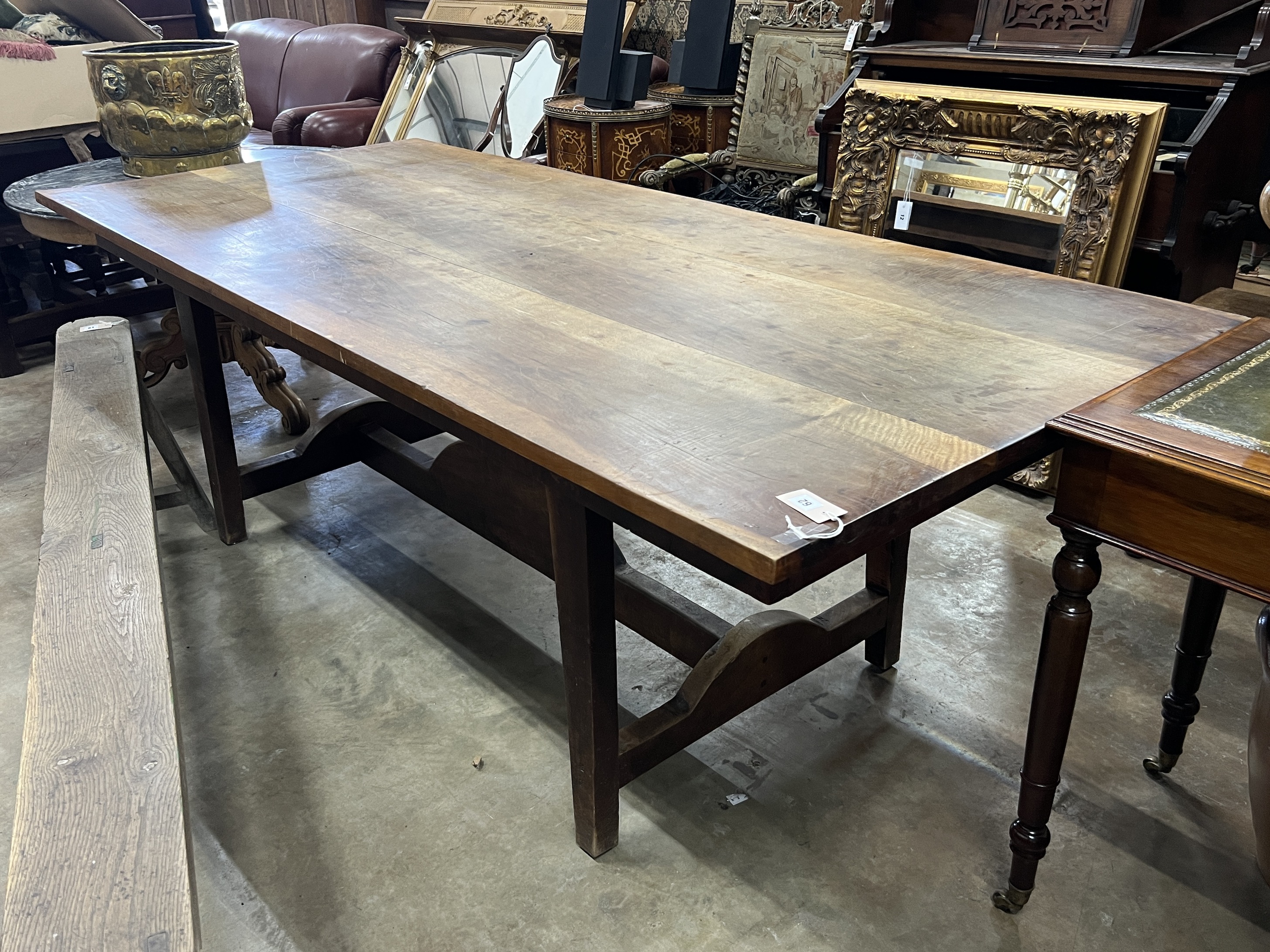An early 20th century French cherry rectangular kitchen table, length 224cm, depth 100cm, height 76cm                                                                                                                       