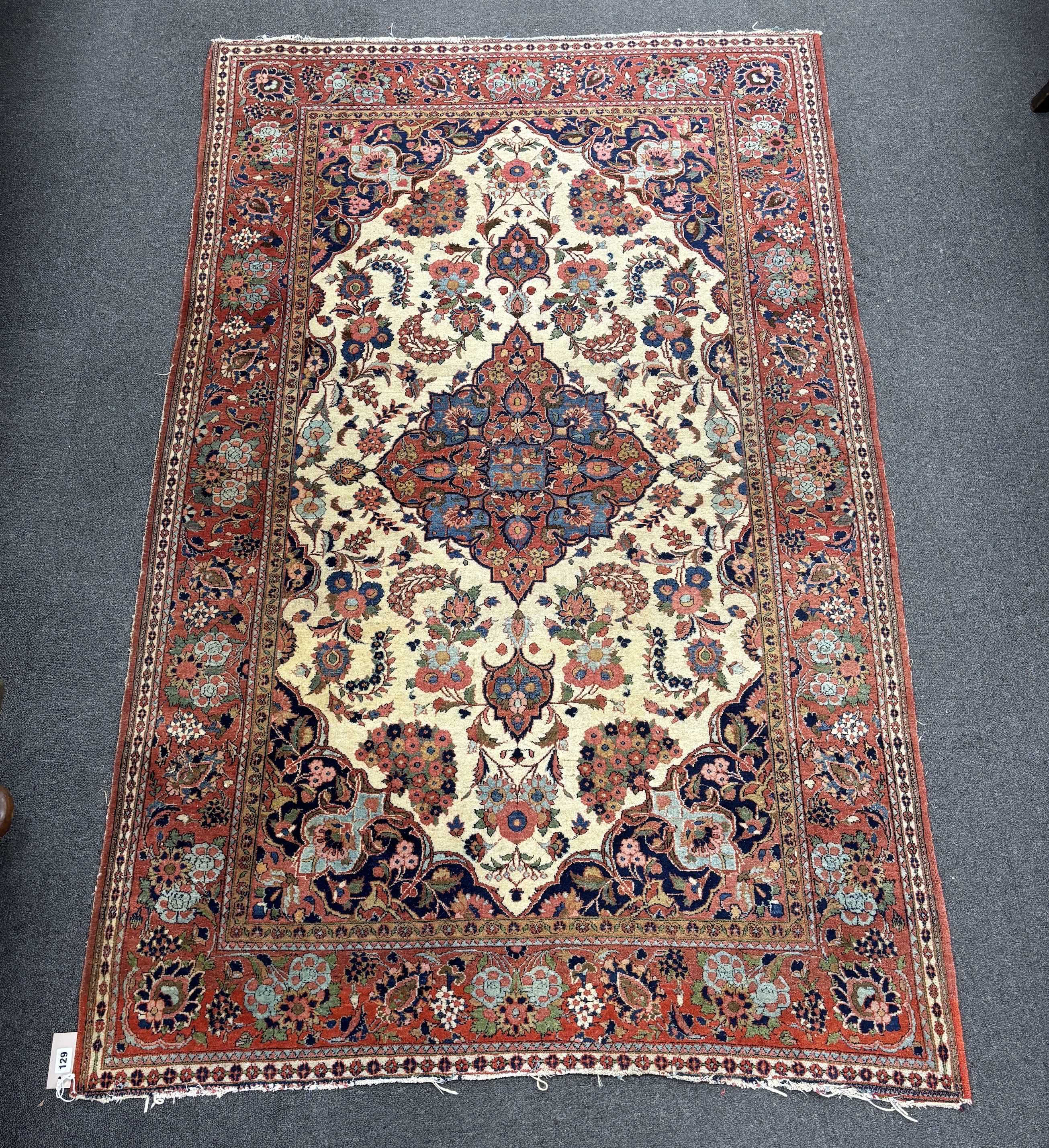 A North West Persian ivory ground rug, 204 x 127cm                                                                                                                                                                          