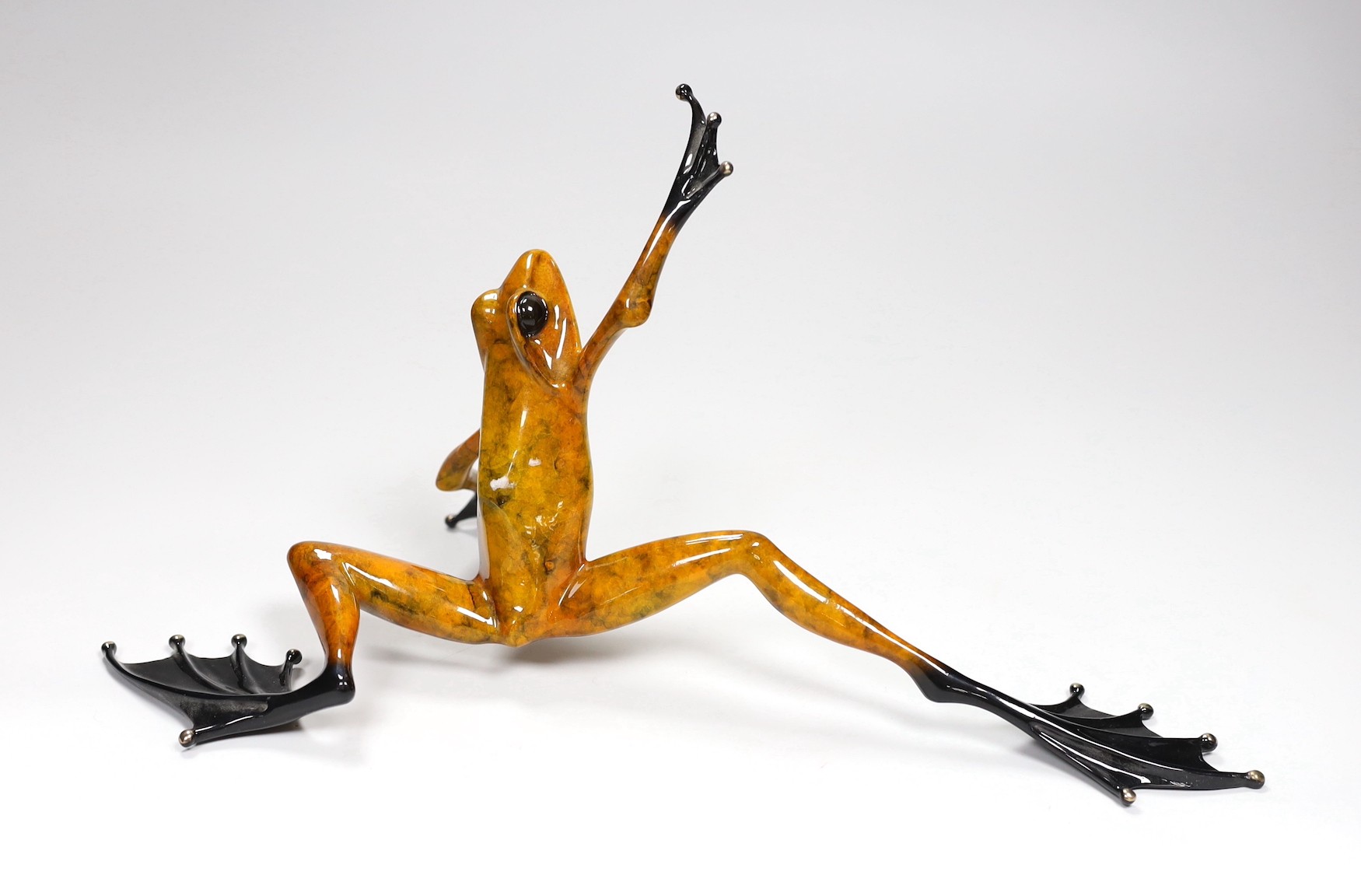 Tim Cotterill (Frogman) a limited edition enamelled bronze frog ‘High Dive’ 1807/5000 with certificate of authenticity. 36.5cm wide                                                                                         