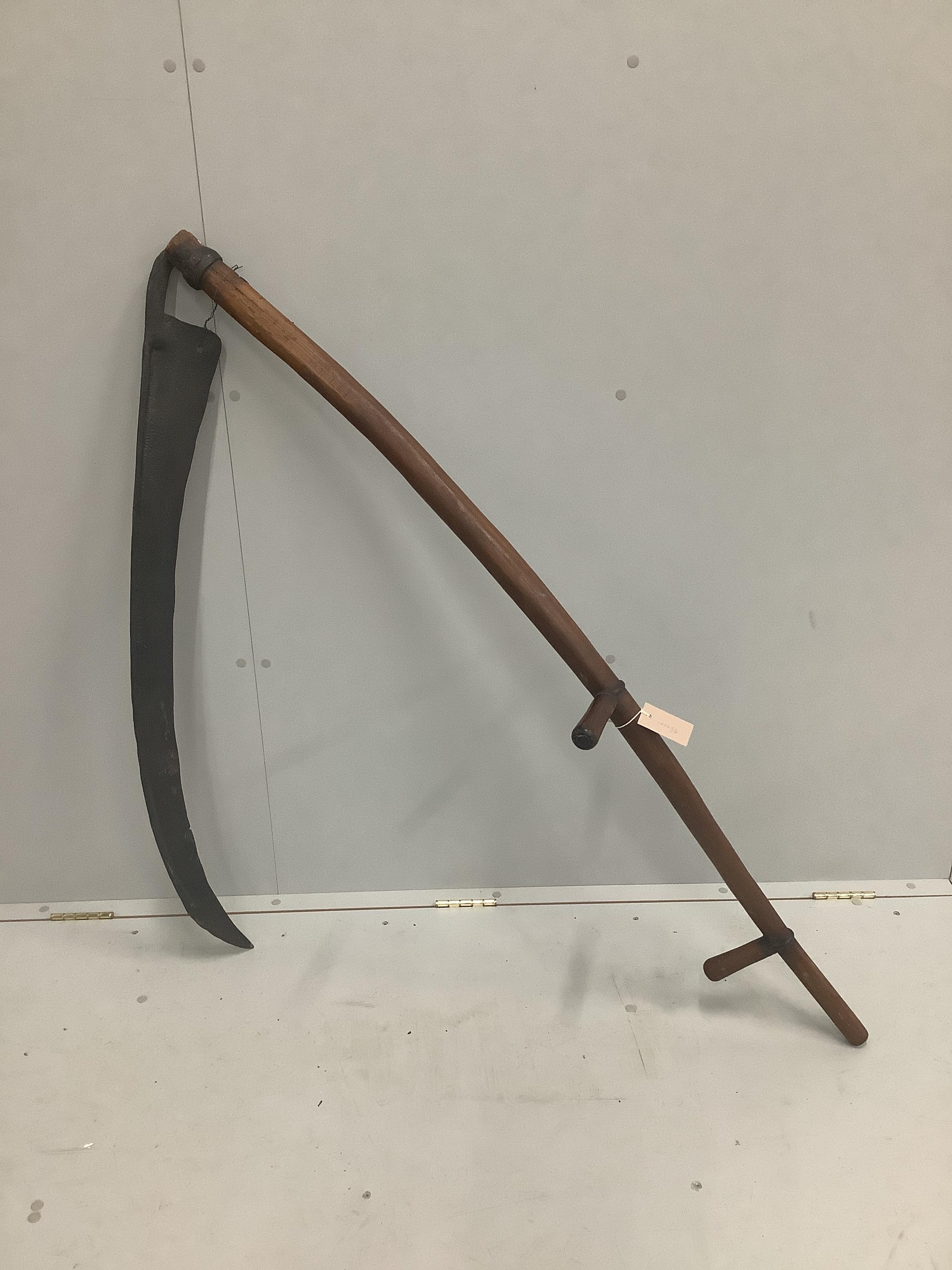 A large vintage scythe, length 157cm                                                                                                                                                                                        