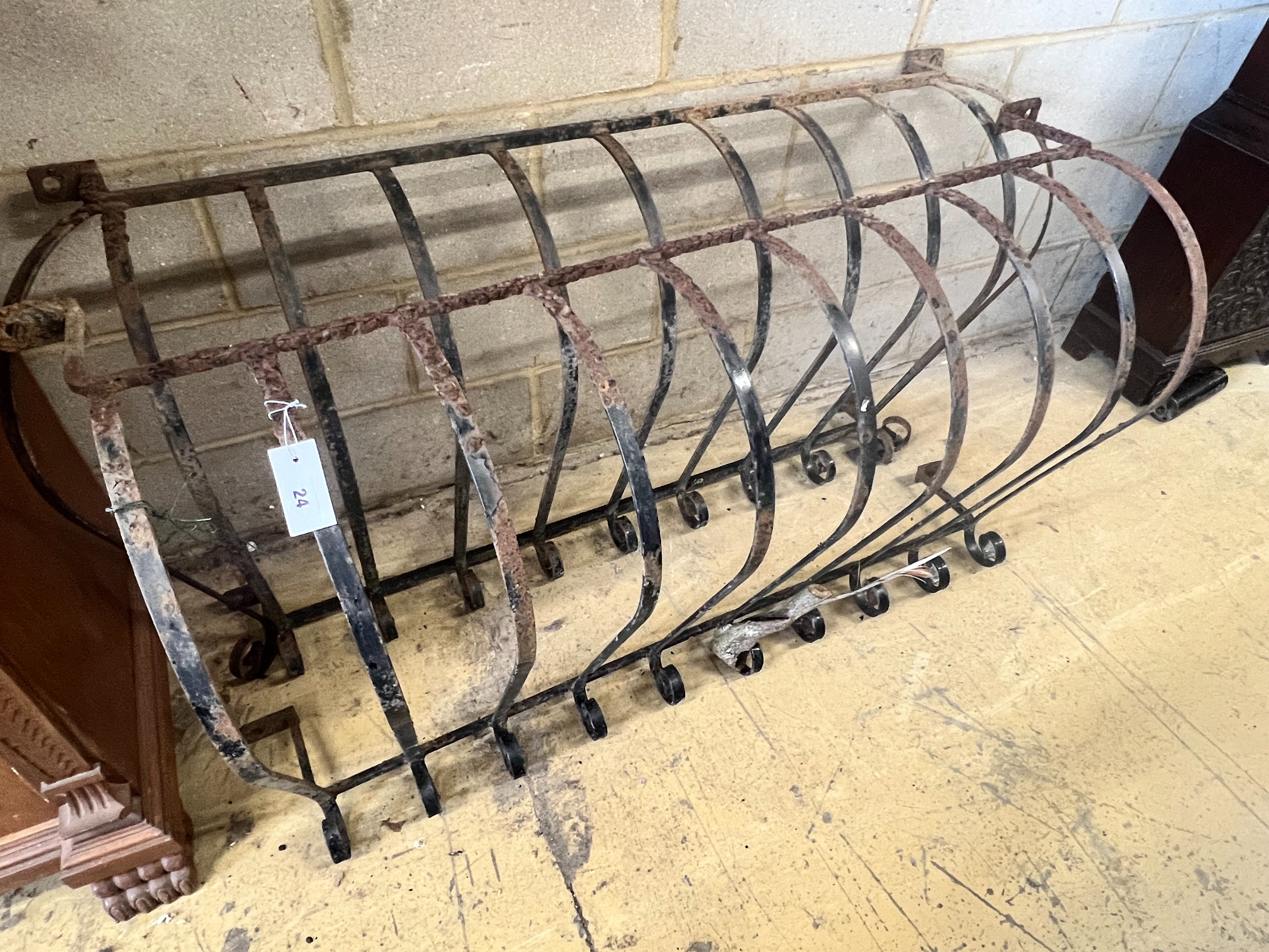 A pair of wrought iron bowfront balcony rails, widest 140cm height 71cm                                                                                                                                                     