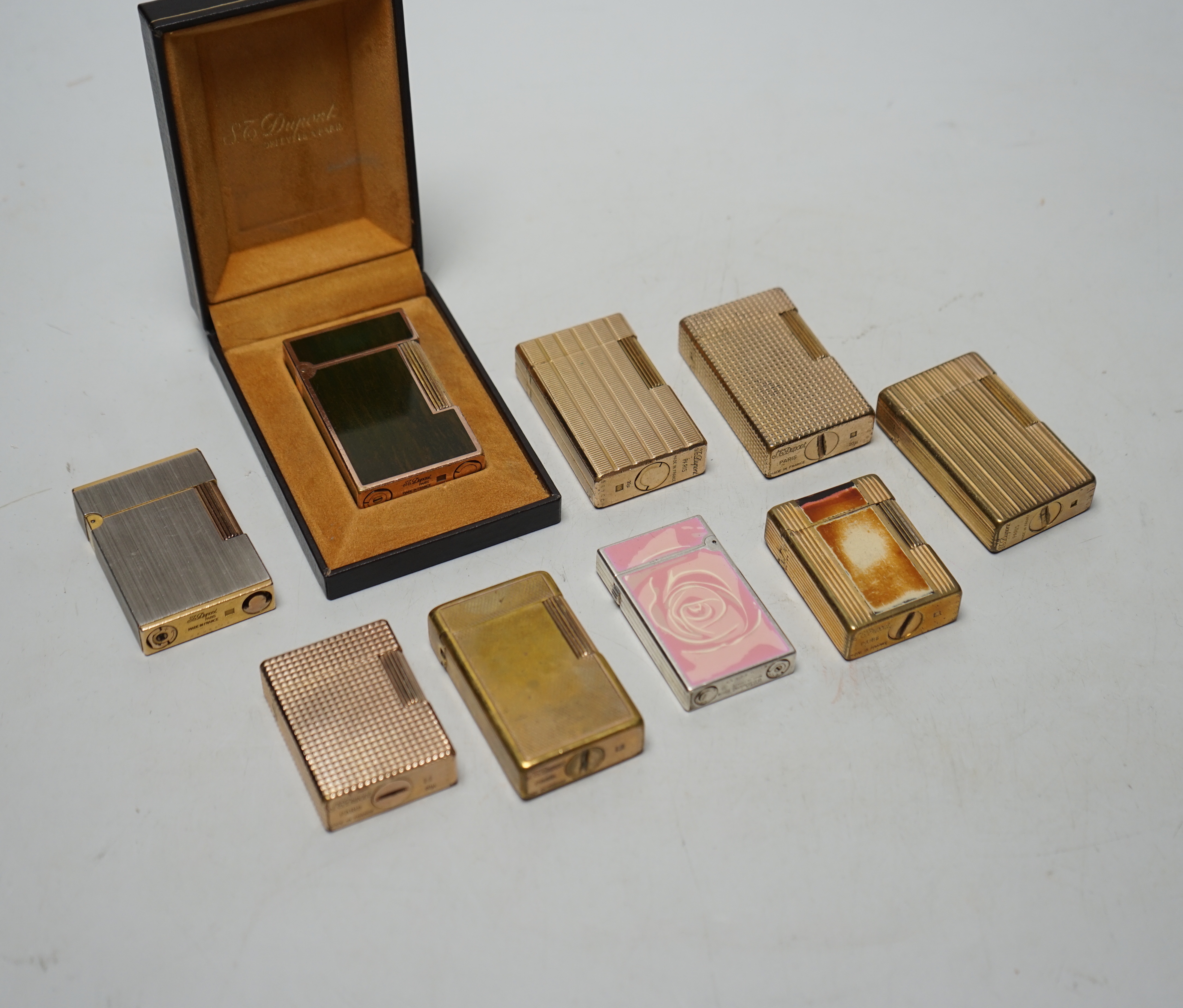 Nine Dupont cigarette lighters                                                                                                                                                                                              