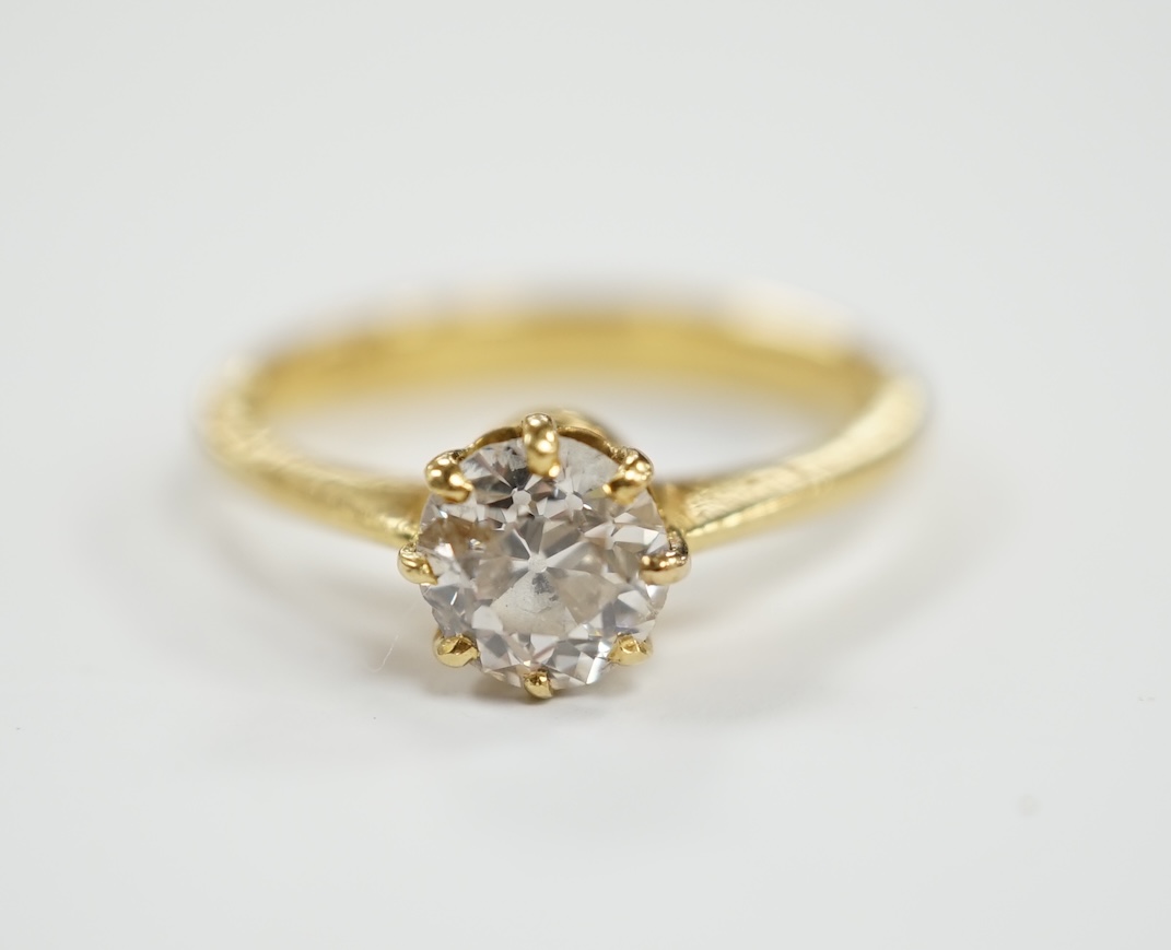 An 18ct gold and solitaire diamond set ring, size O, gross weight 3.5 grams, stone diameter approx. 6.2mm.                                                                                                                  