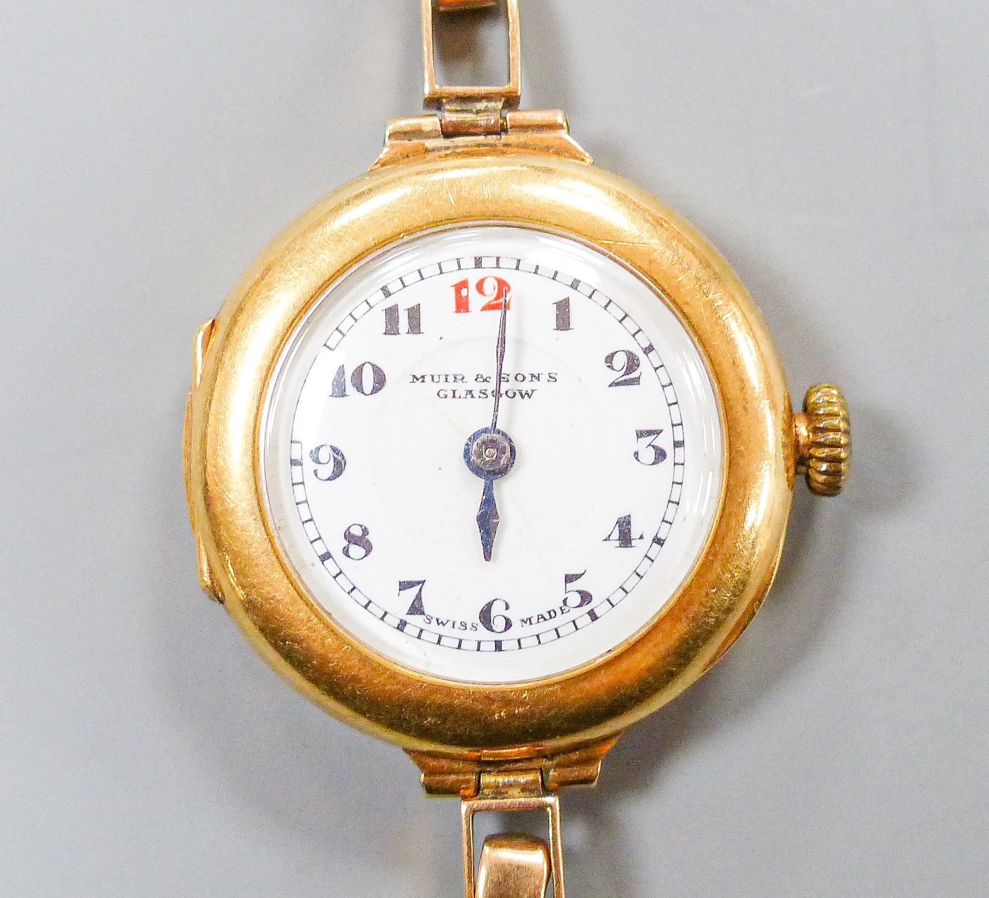 A lady's George V 18ct gold cased manual wind wrist watch, lacking bracelet, case hallmarked for Birmingham, 1917, retailed by Muir & Sons, Glasgow                                                                         