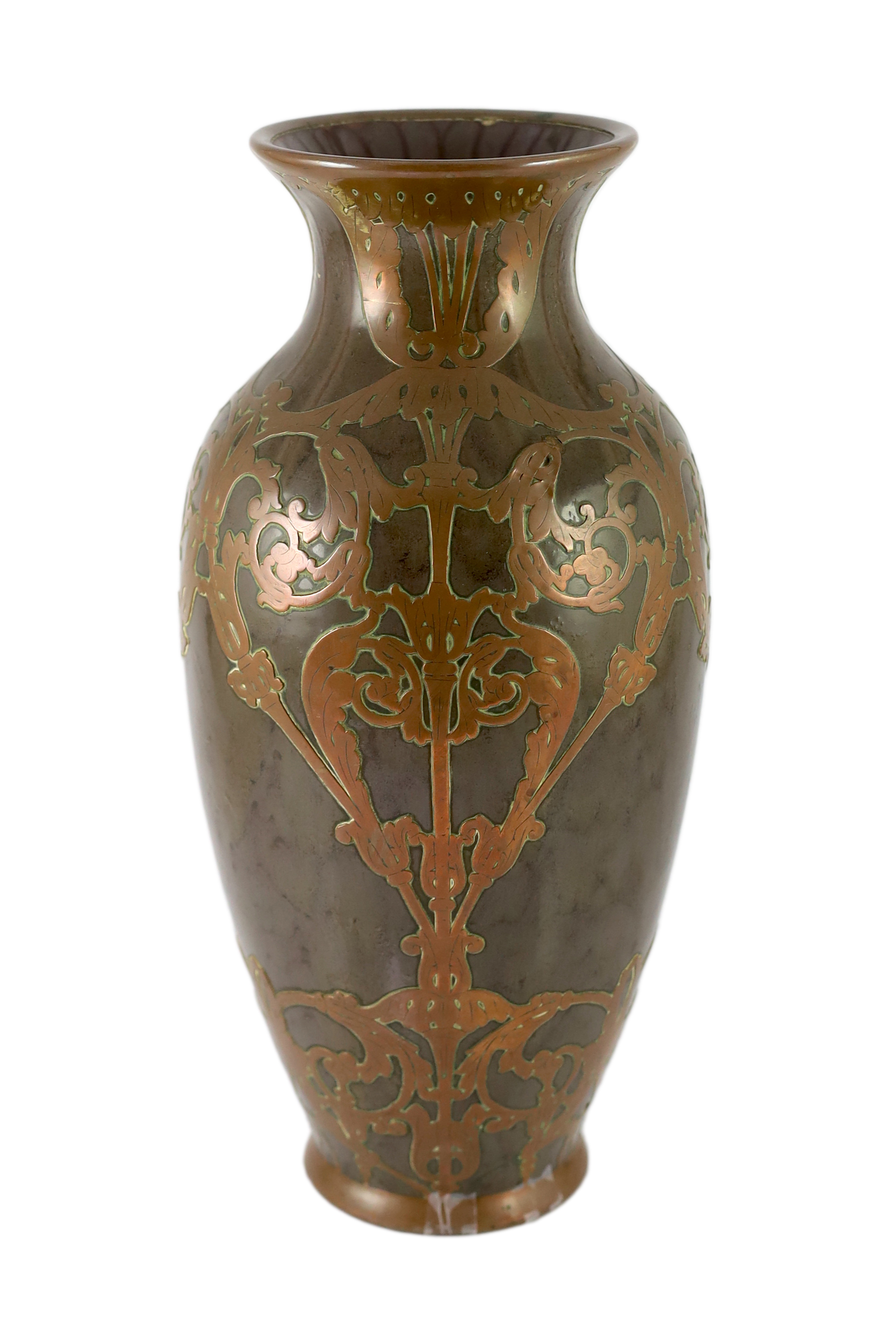 Attributed to Peter Behrens (German, 1868-1940). An Art Nouveau pottery and copper overlaid vase by Marzi & Remy, Hohr                                                                                                      