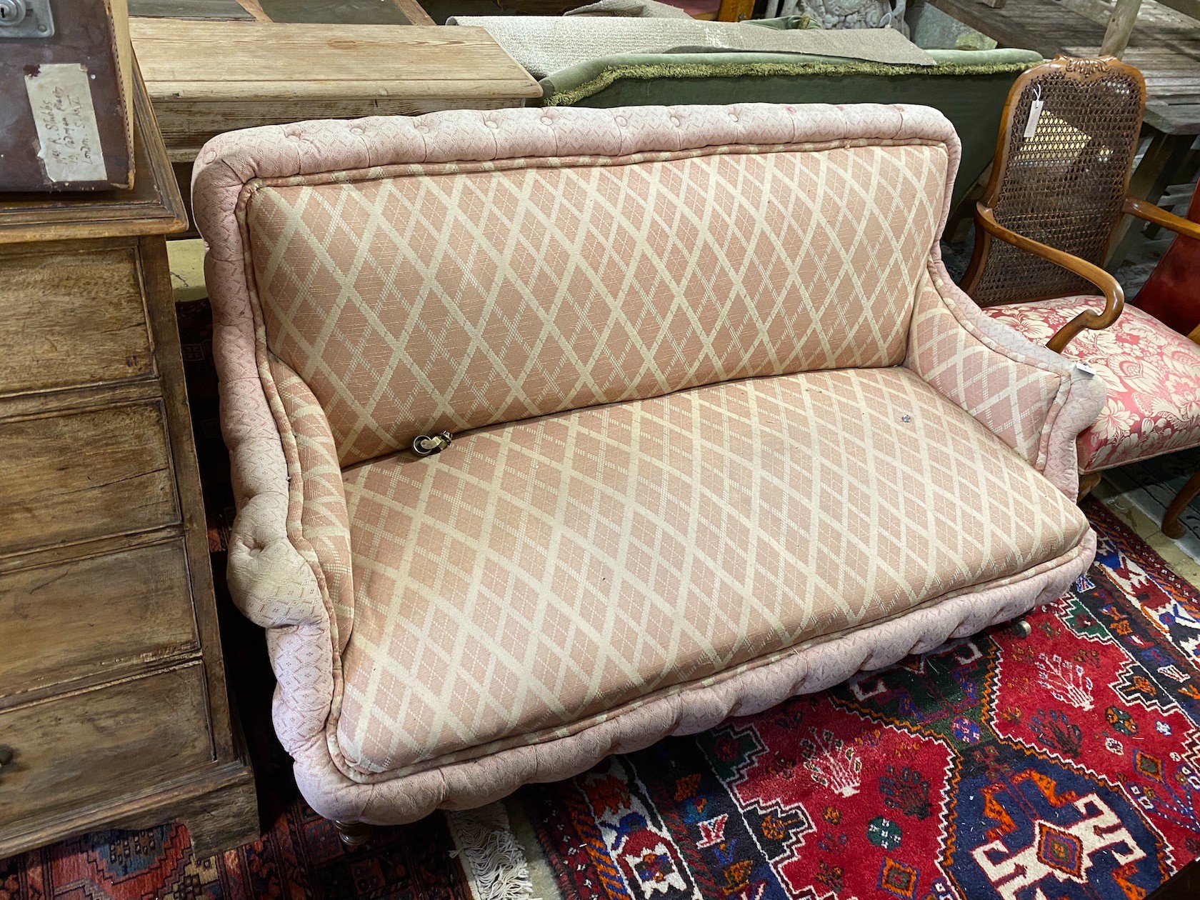 A Victorian upholstered settee, length 150cm, depth 66cm, height 78cm                                                                                                                                                       
