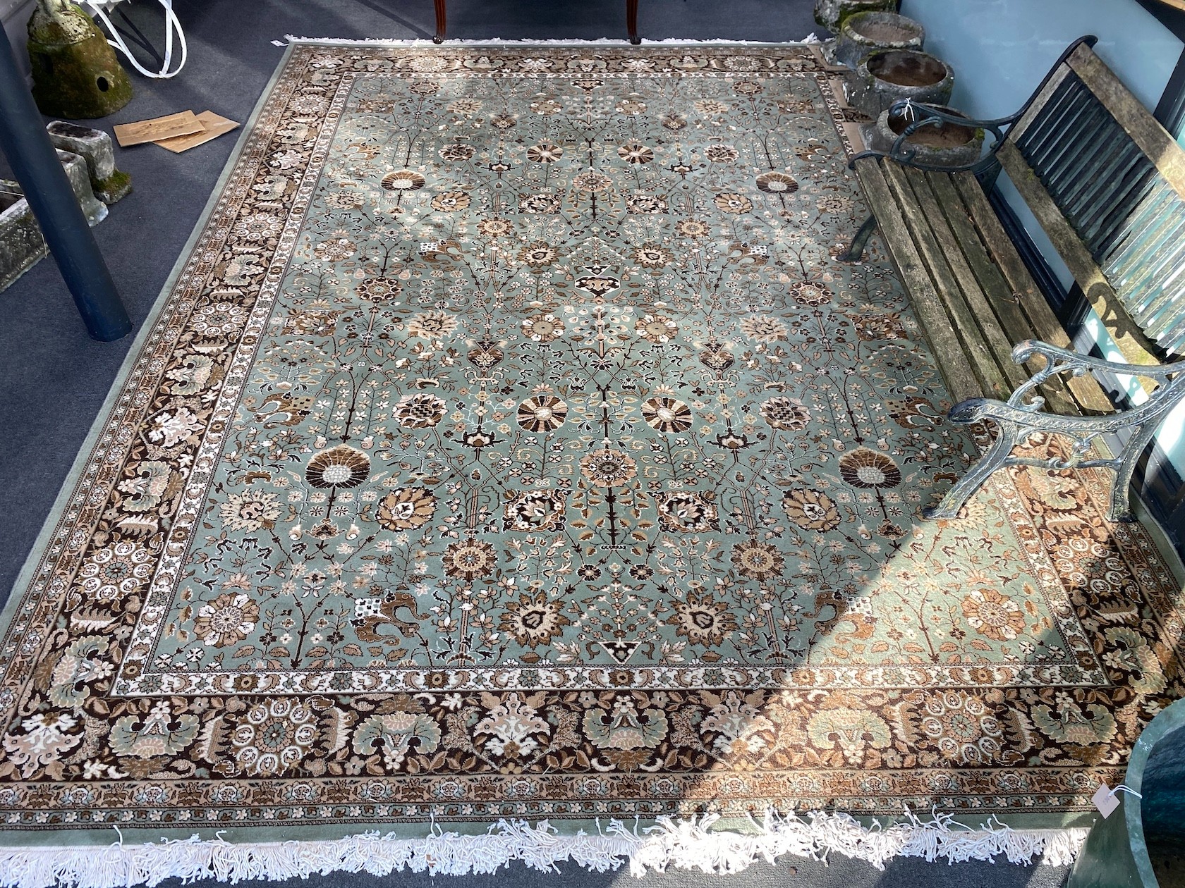 A Tabriz style green ground carpet, 400 x 300cm                                                                                                                                                                             