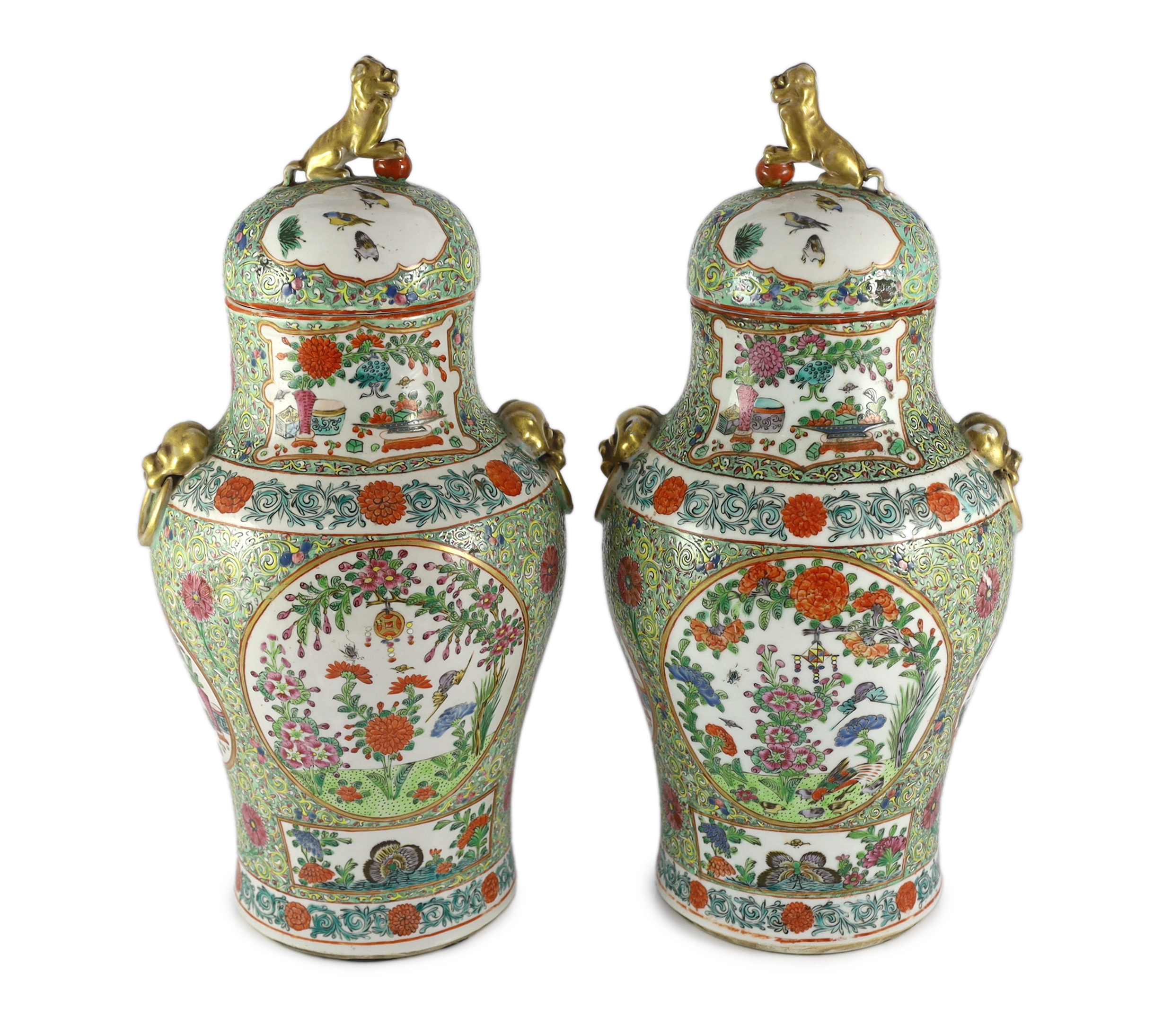 A pair of Chinese enamelled porcelain vases and covers, early 20th century                                                                                                                                                  