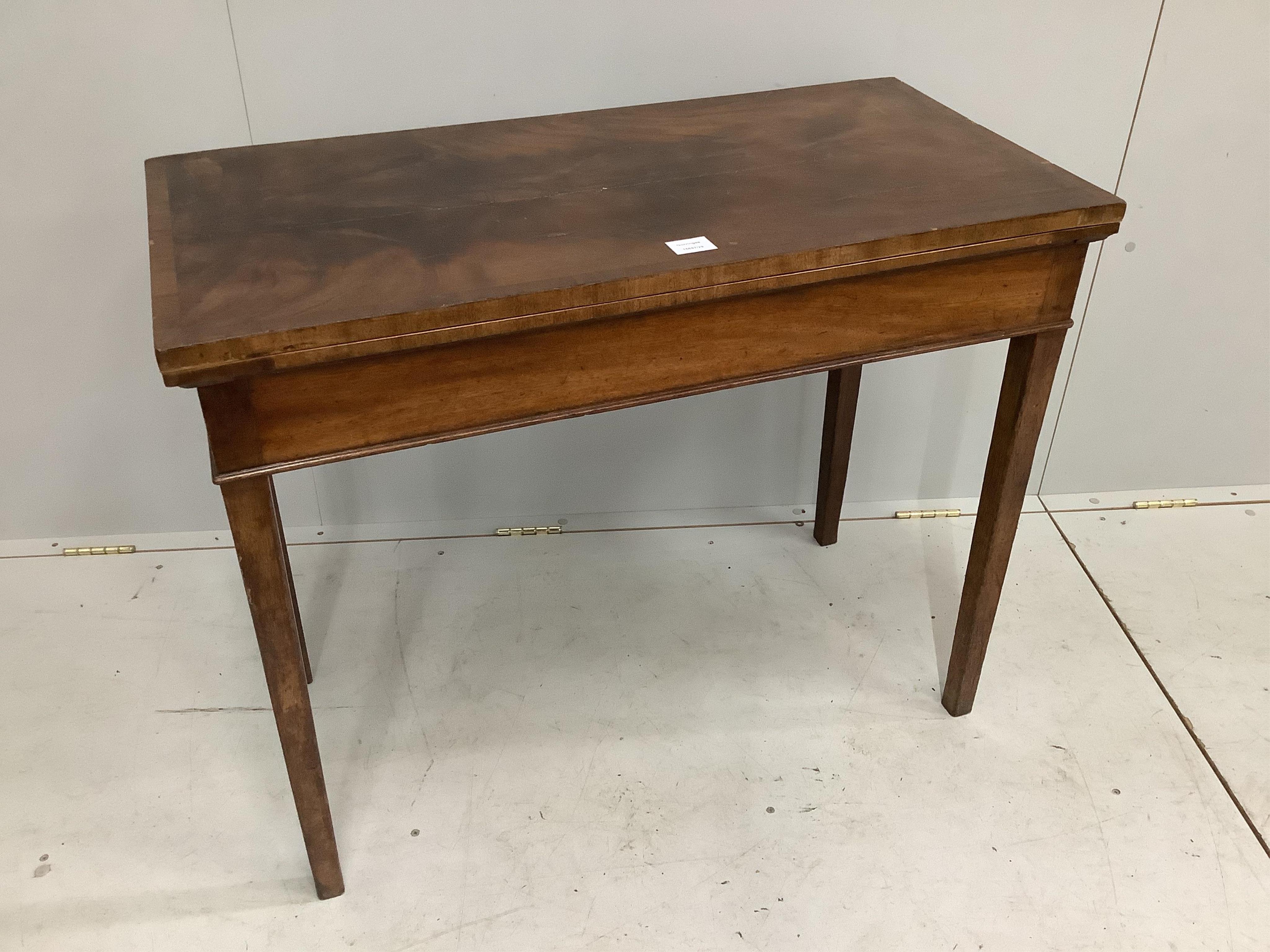 A George III rectangular mahogany folding card table, width 91cm, depth 45cm, height 73cm. Condition - poor                                                                                                                 