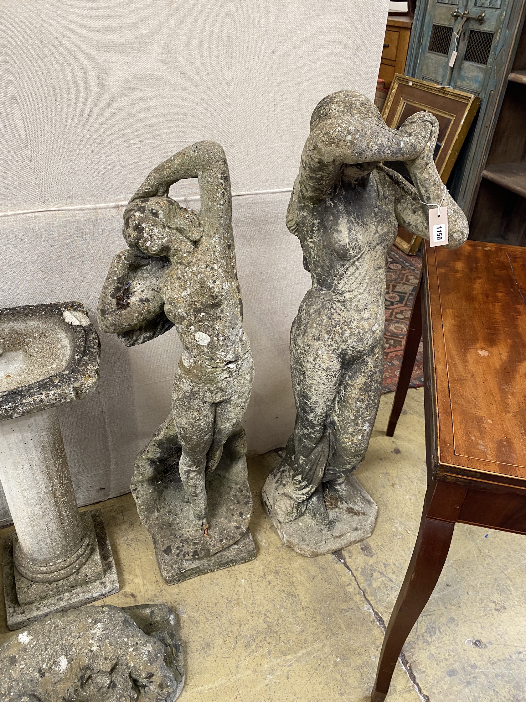 Two reconstituted stone figural garden ornaments, larger height 115cm                                                                                                                                                       