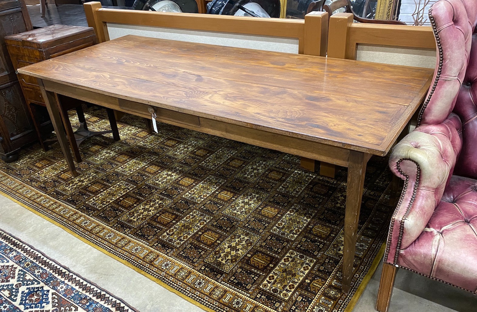 A rectangular French style oak kitchen table from a factory in France, length 204cm, depth 85cm, height 75cm                                                                                                                
