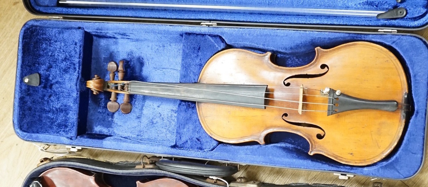 A German violin, in case, 60cms wide                                                                                                                                                                                        