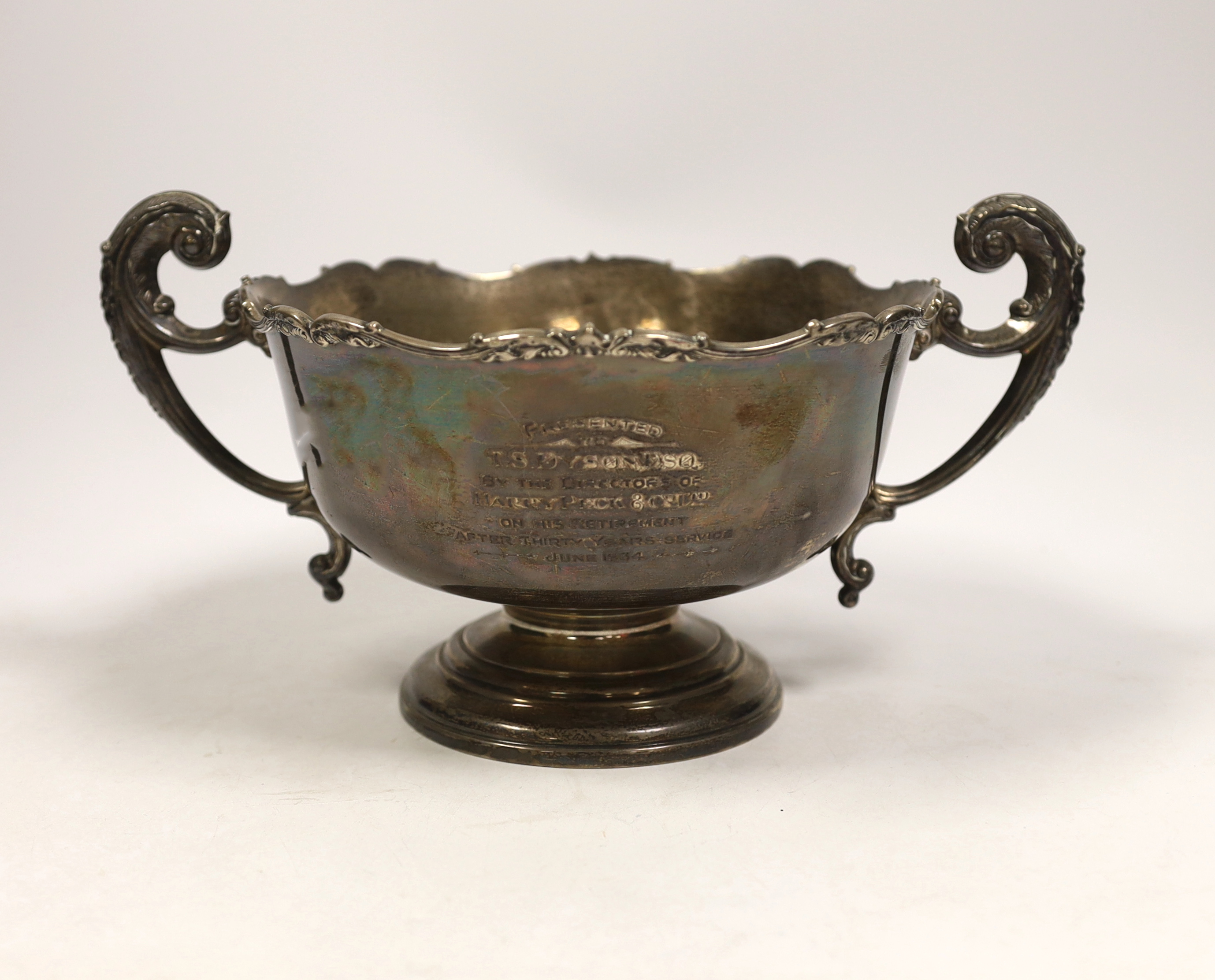 A George V silver two handled presentation trophy cup, with engraved inscription, Adie Brothers, Birmingham, 1933, diameter 20.6cm, 21.1oz.                                                                                 