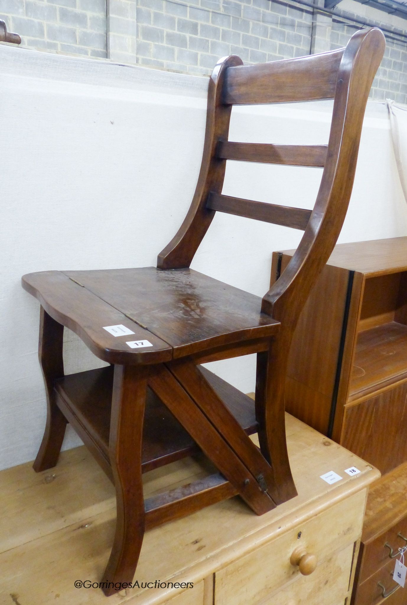 A reproduction mahogany metamorphic library chair                                                                                                                                                                           