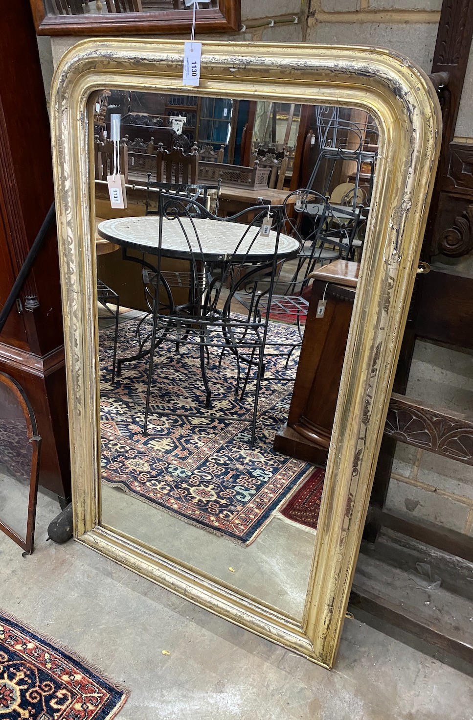 A 19th century French gilt overmantel mirror, width 83cm, height 139cm                                                                                                                                                      