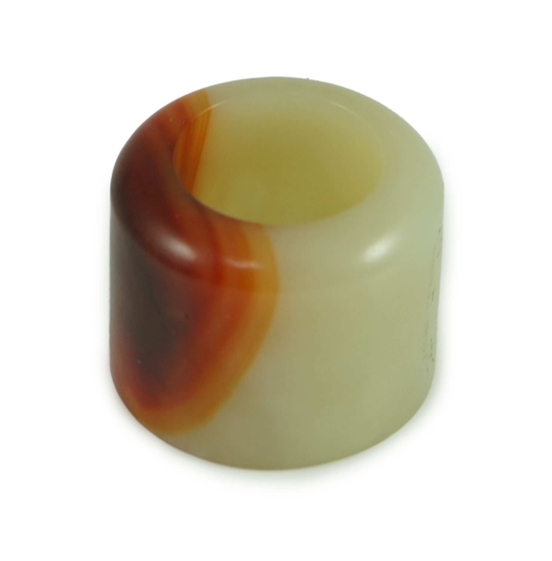 A Chinese pale celadon and russet jade archer's ring, early 20th century 3.4 cm diameter                                                                                                                                    