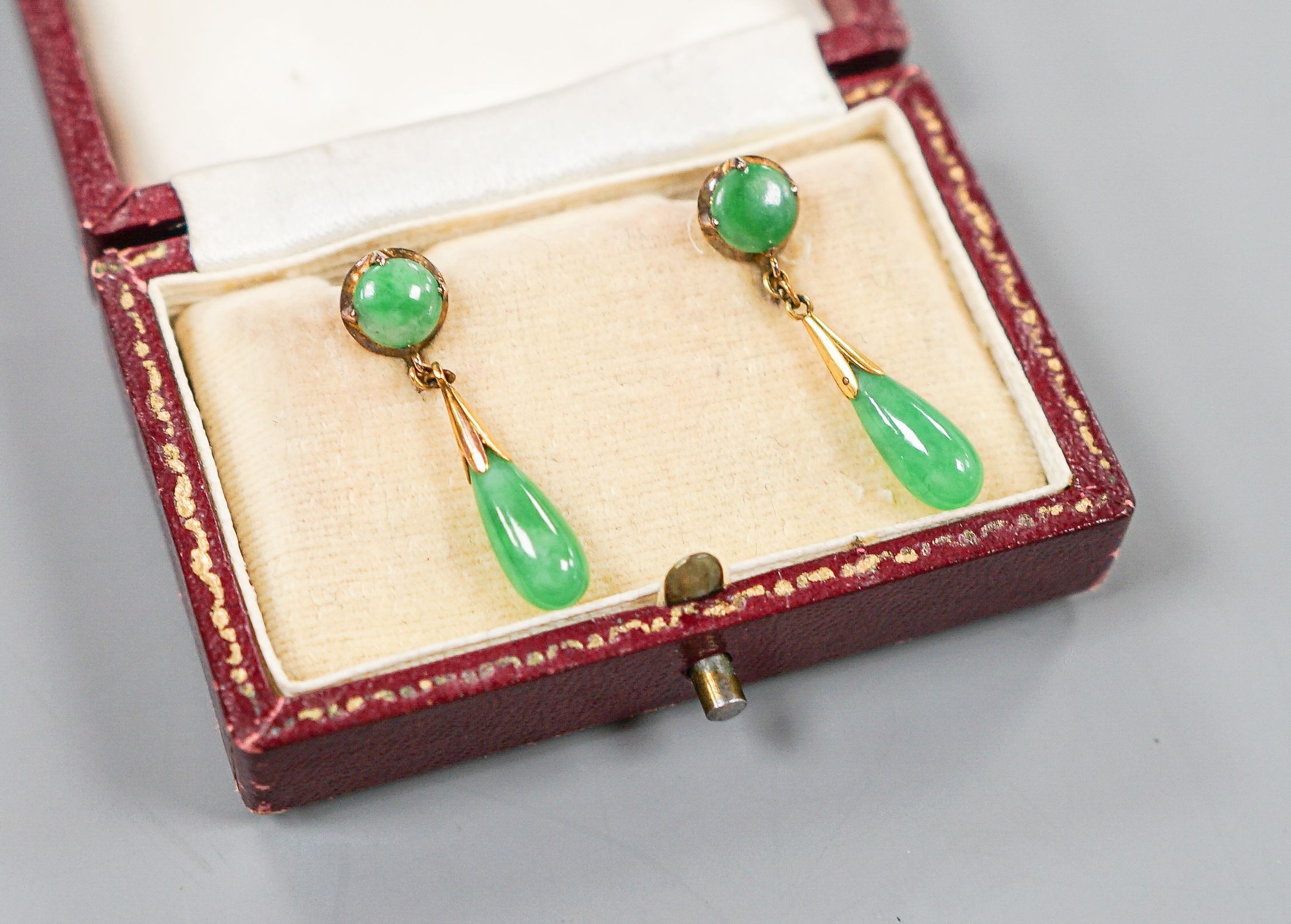 A pair of 20th century 14k and cabochon jade set drop earrings, 30mm, gross weight 3.1 grams.                                                                                                                               