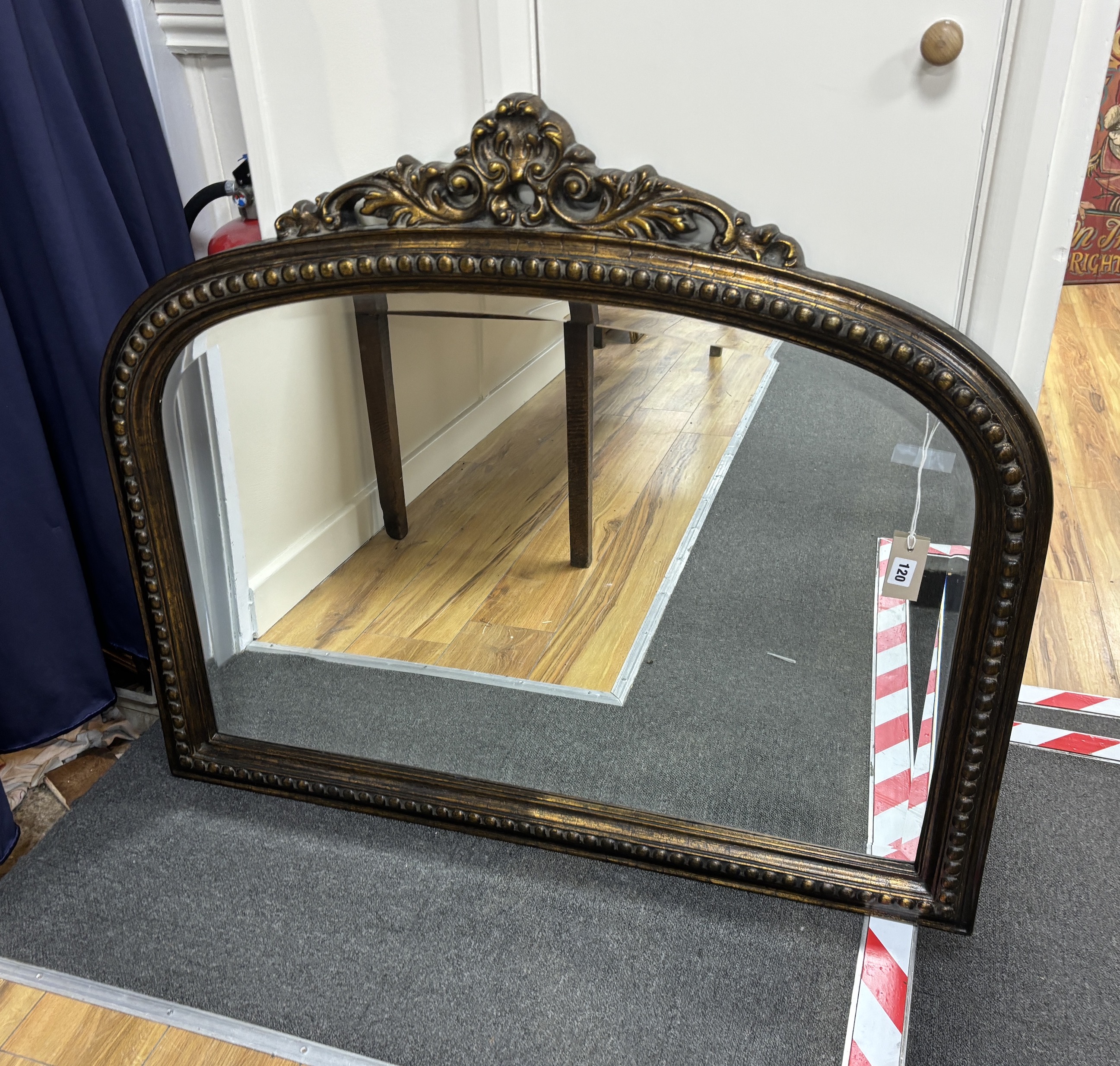 A Victorian style composition overmantel mirror, width 105cm, height 90cm                                                                                                                                                   